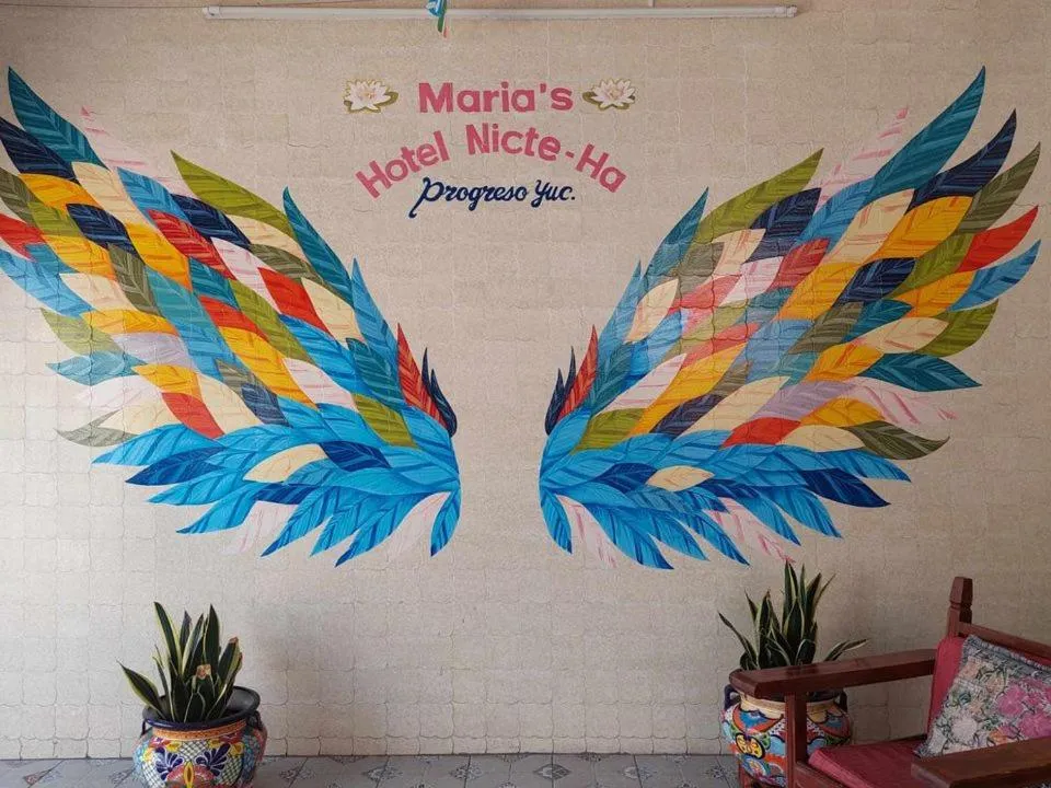 Property logo or sign in Hotel Maria's Nicte Ha