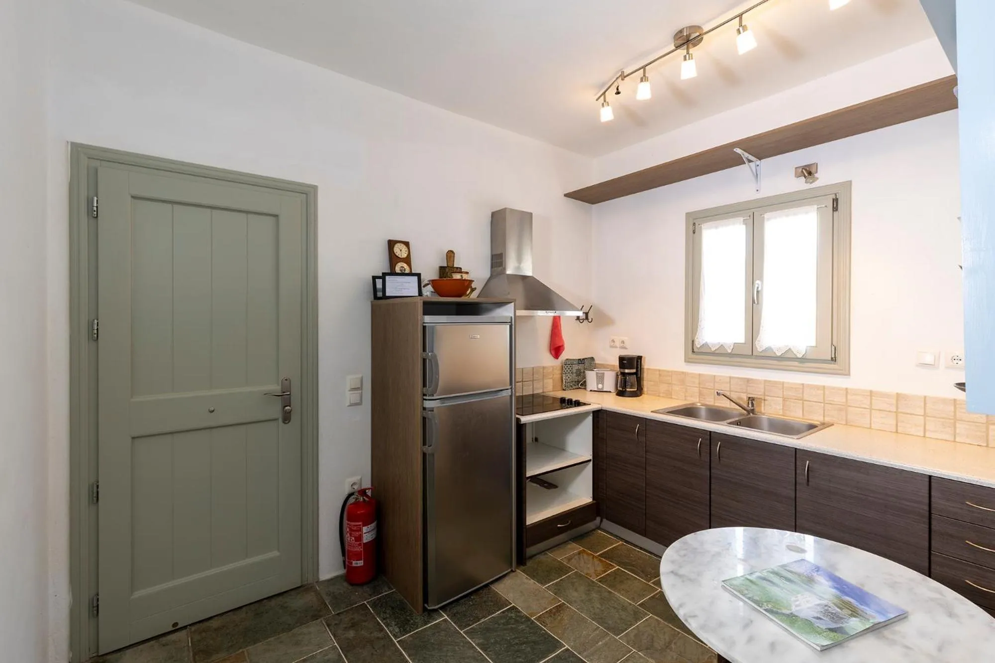 Kitchen or kitchenette in Maison a la Plage
