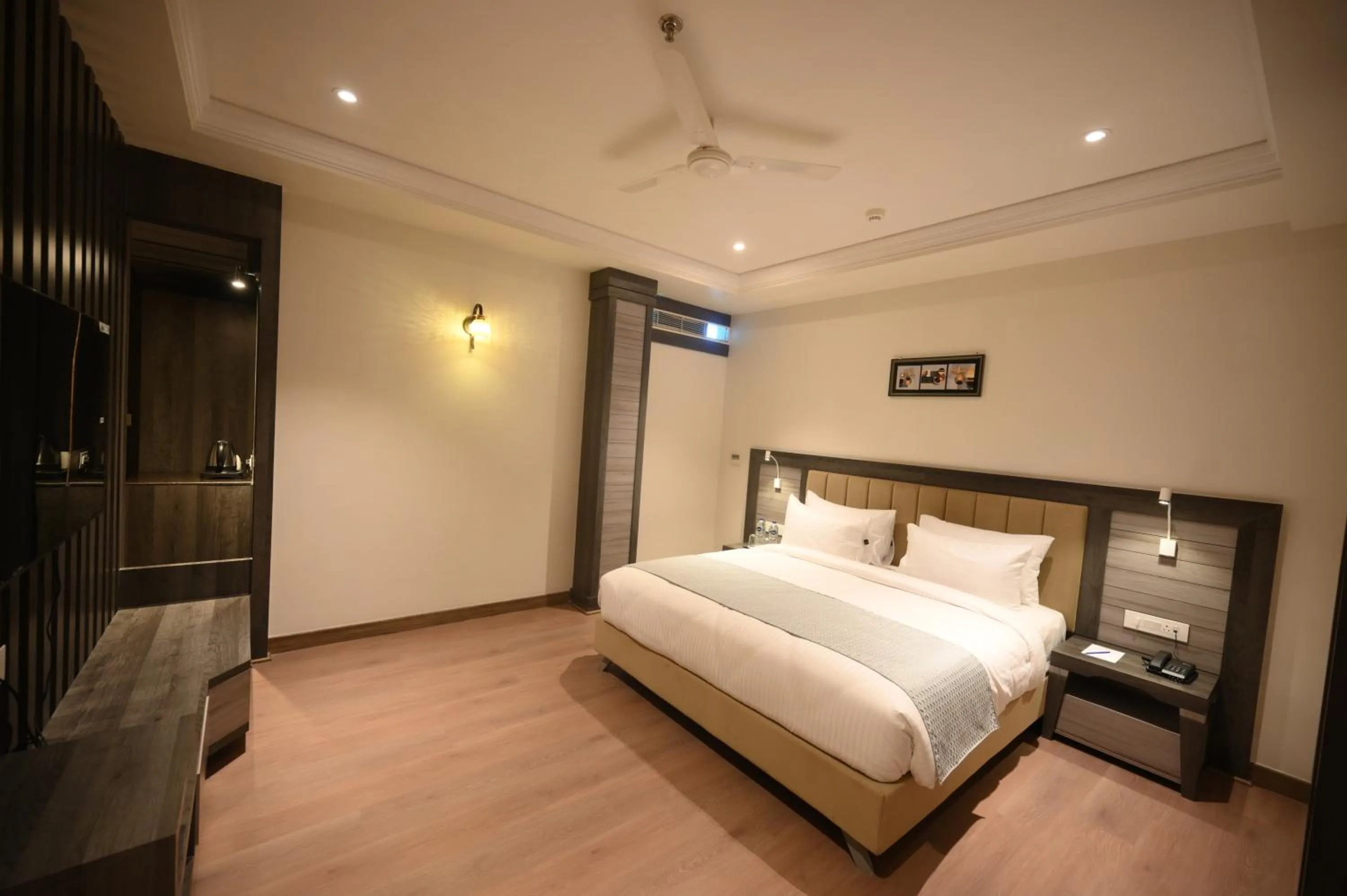 Bed in The Mudra Hotel