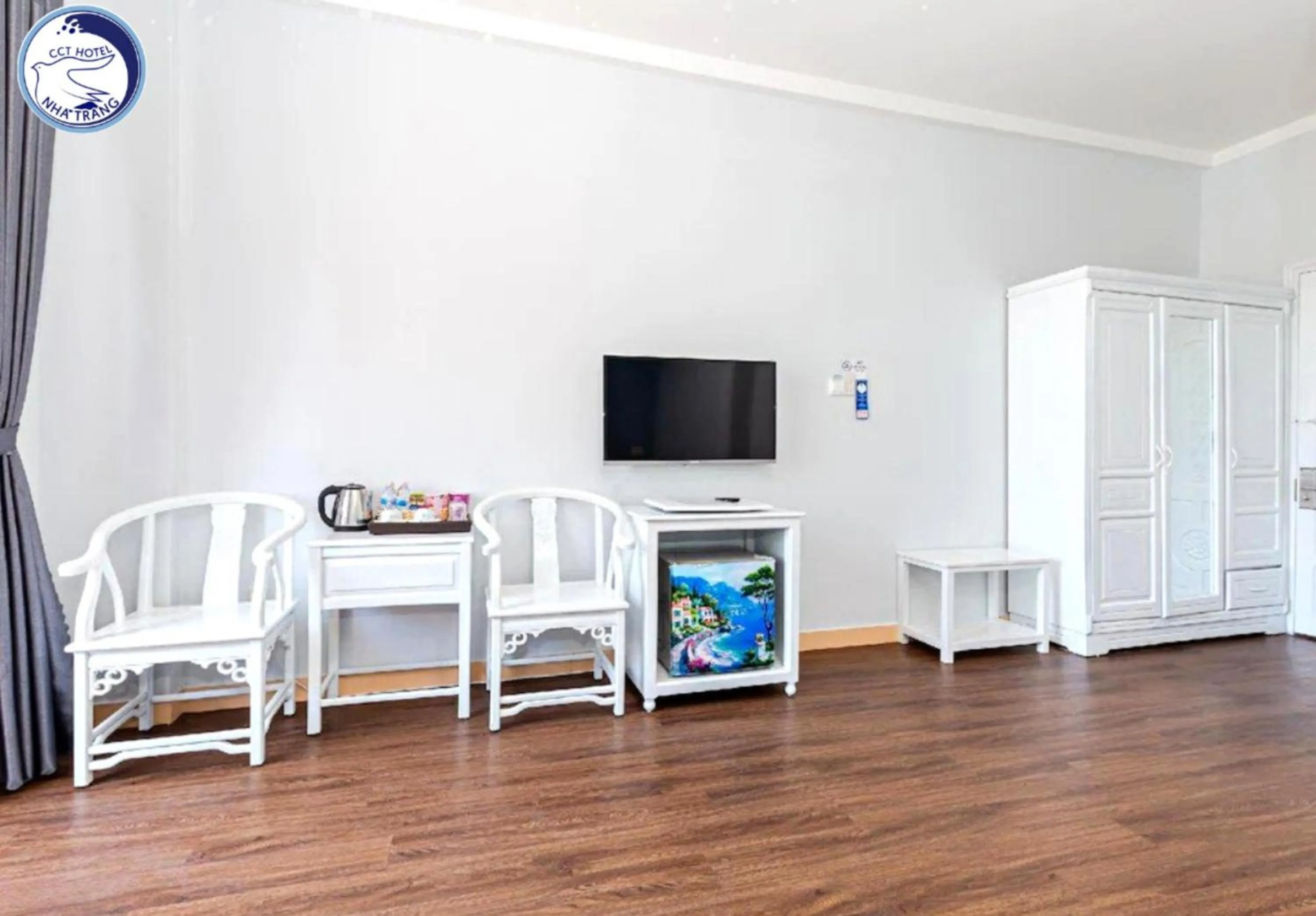 Communal lounge/ TV room in CCT Luxury Hotel