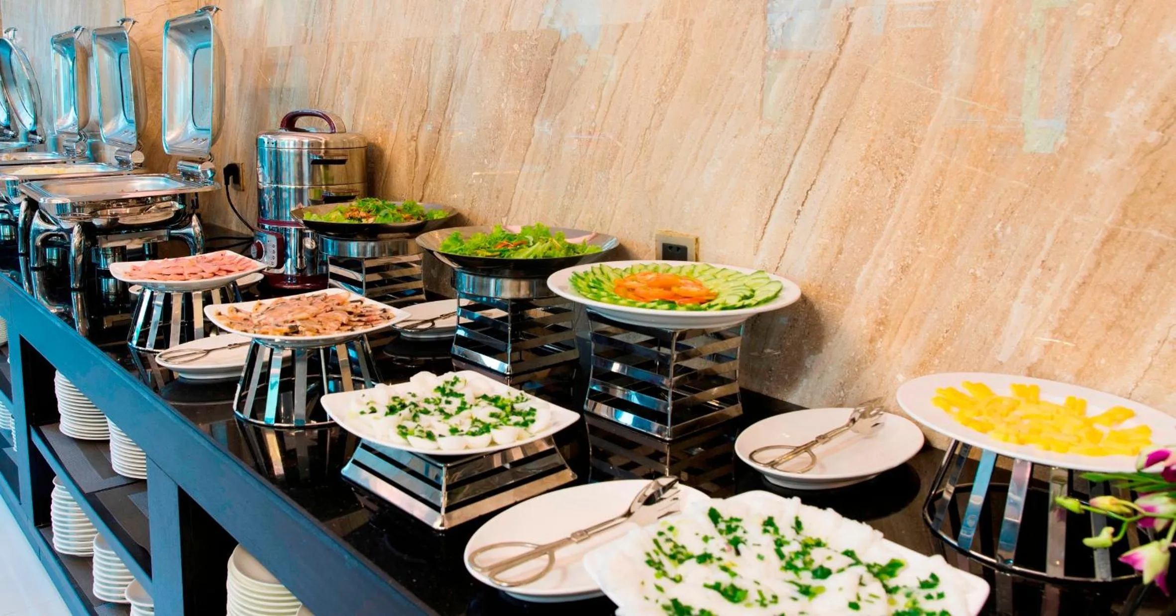 Buffet breakfast in CCT Luxury Hotel