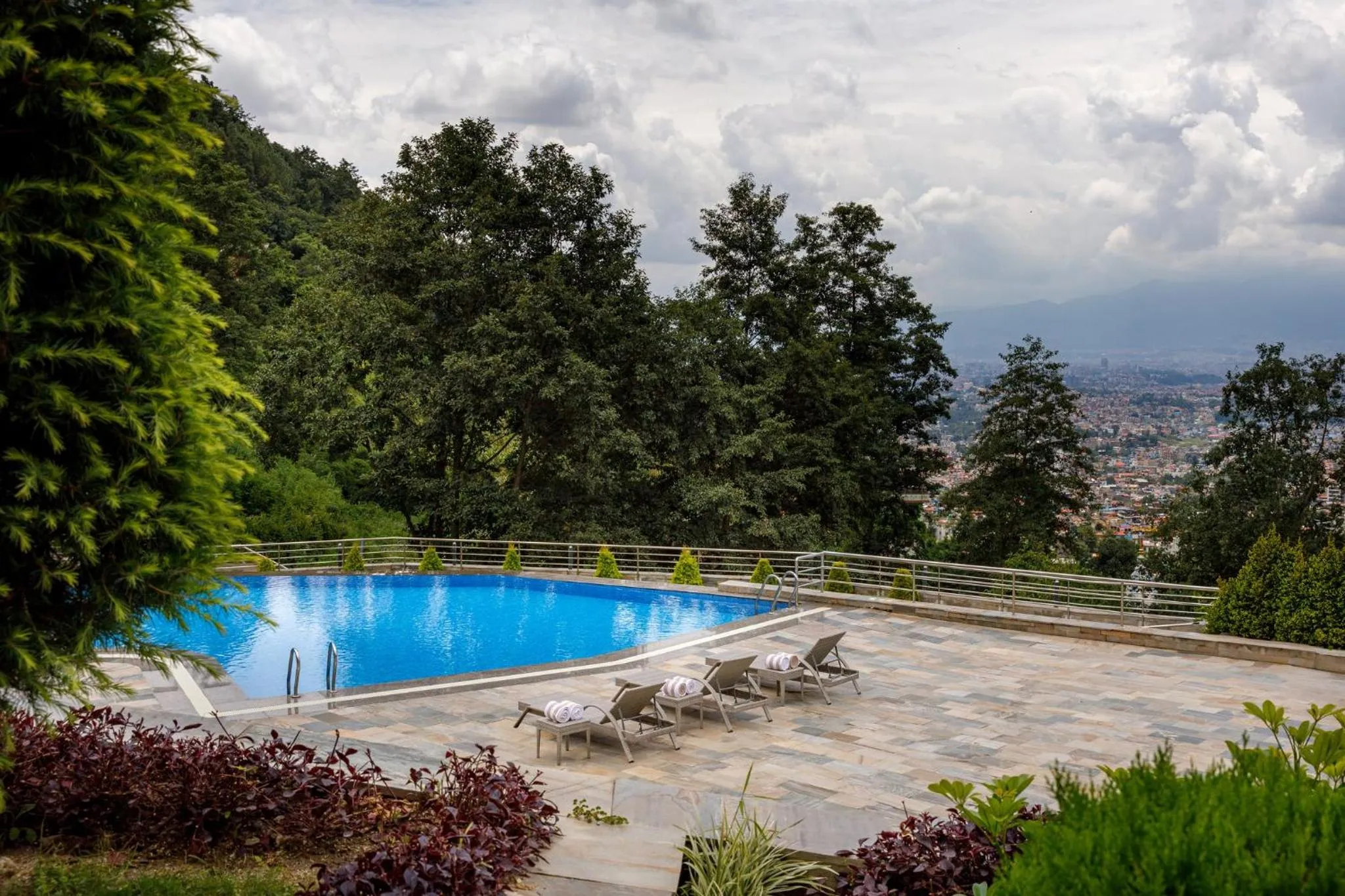 Swimming pool in Holiday Inn Resort Kathmandu Budhanilkantha by IHG