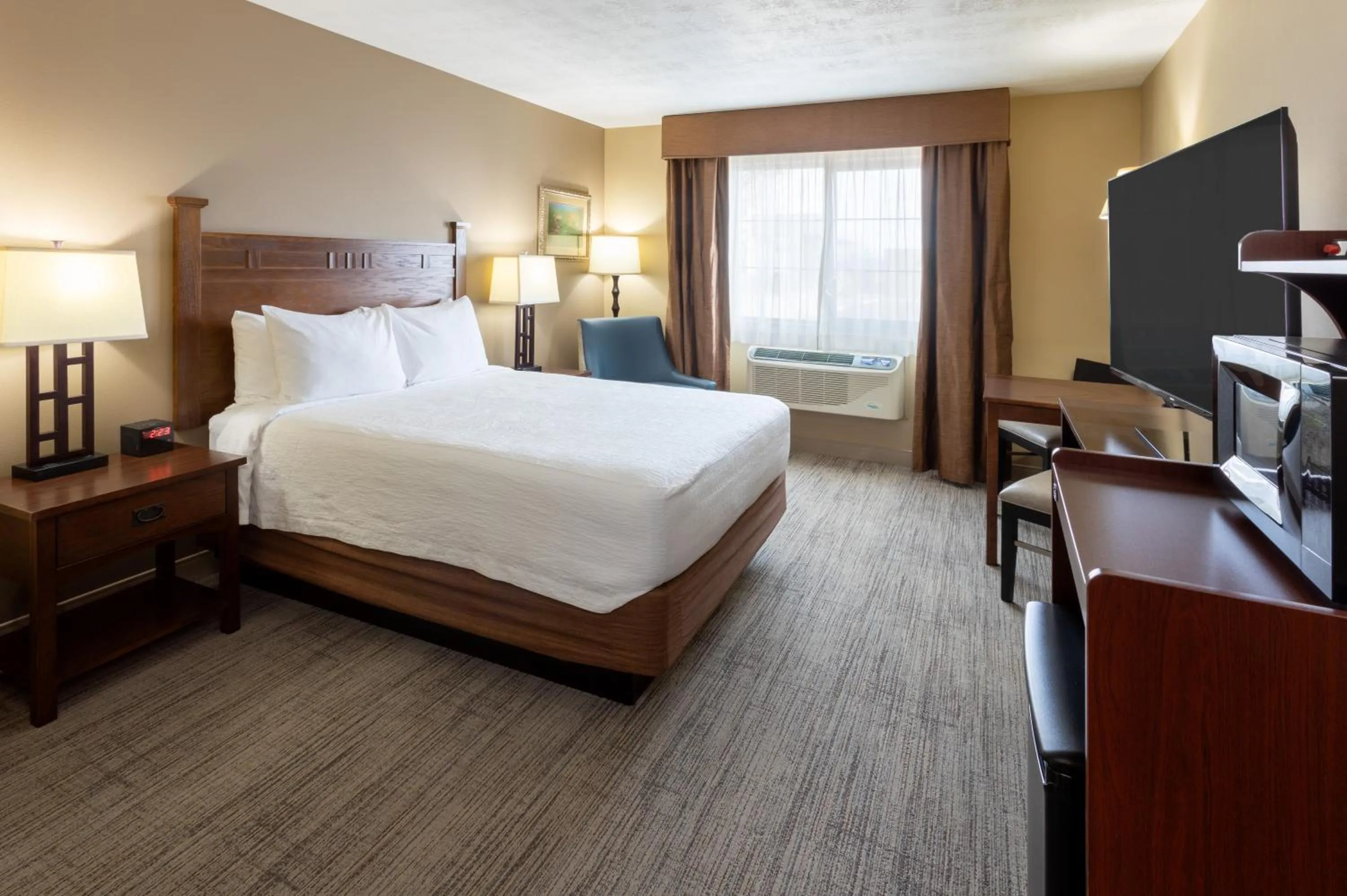 Bed in GrandStay Inn & Suites of Luverne