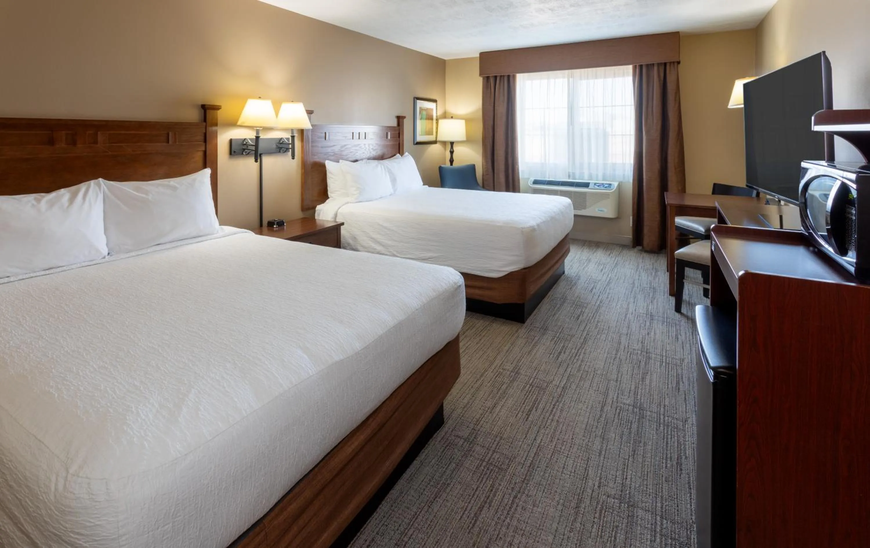 Bed in GrandStay Inn & Suites of Luverne