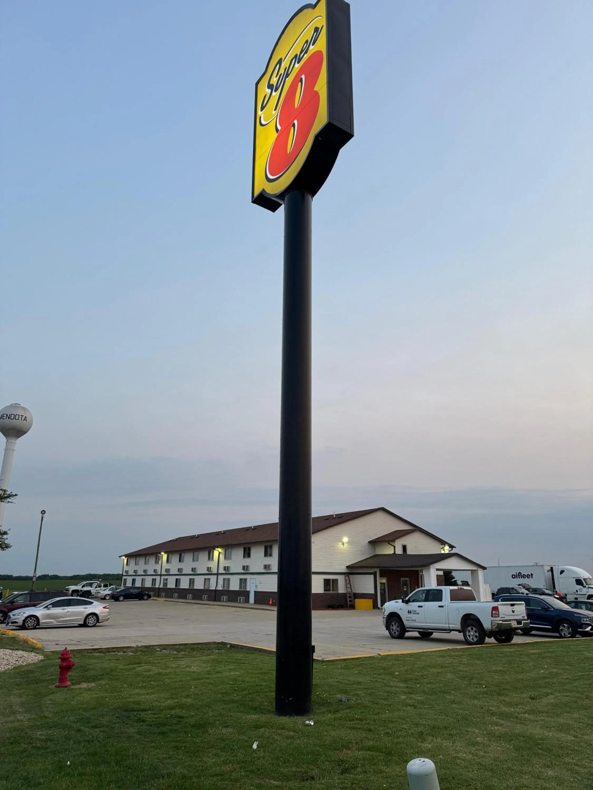 Property logo or sign in Super 8 by Wyndham Mendota I-39