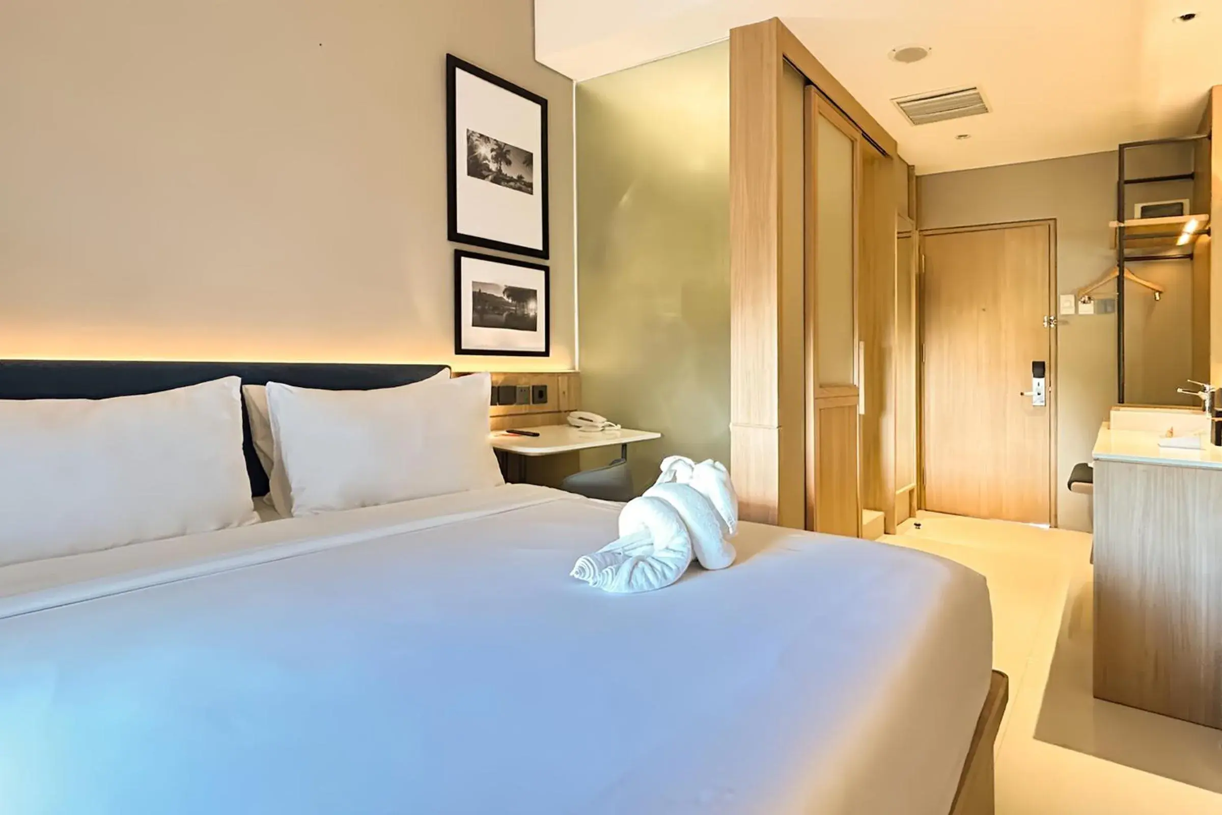 Bed in HARRIS Hotel and Conventions Denpasar Bali Bed in HARRIS Hotel and Conventions Denpasar Bali