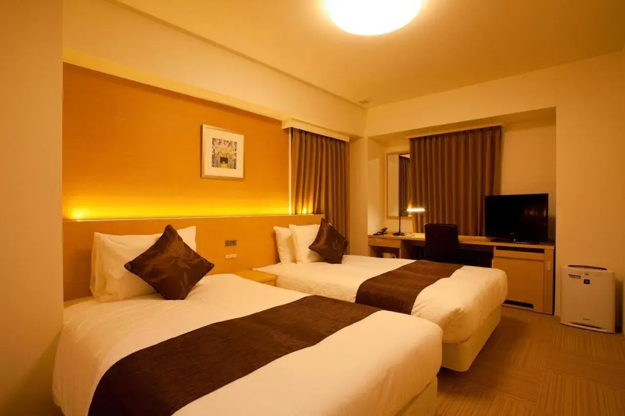 Bed in Shizutetsu Hotel Prezio Shizuoka Ekinan Bed in Shizutetsu Hotel Prezio Shizuoka Ekinan