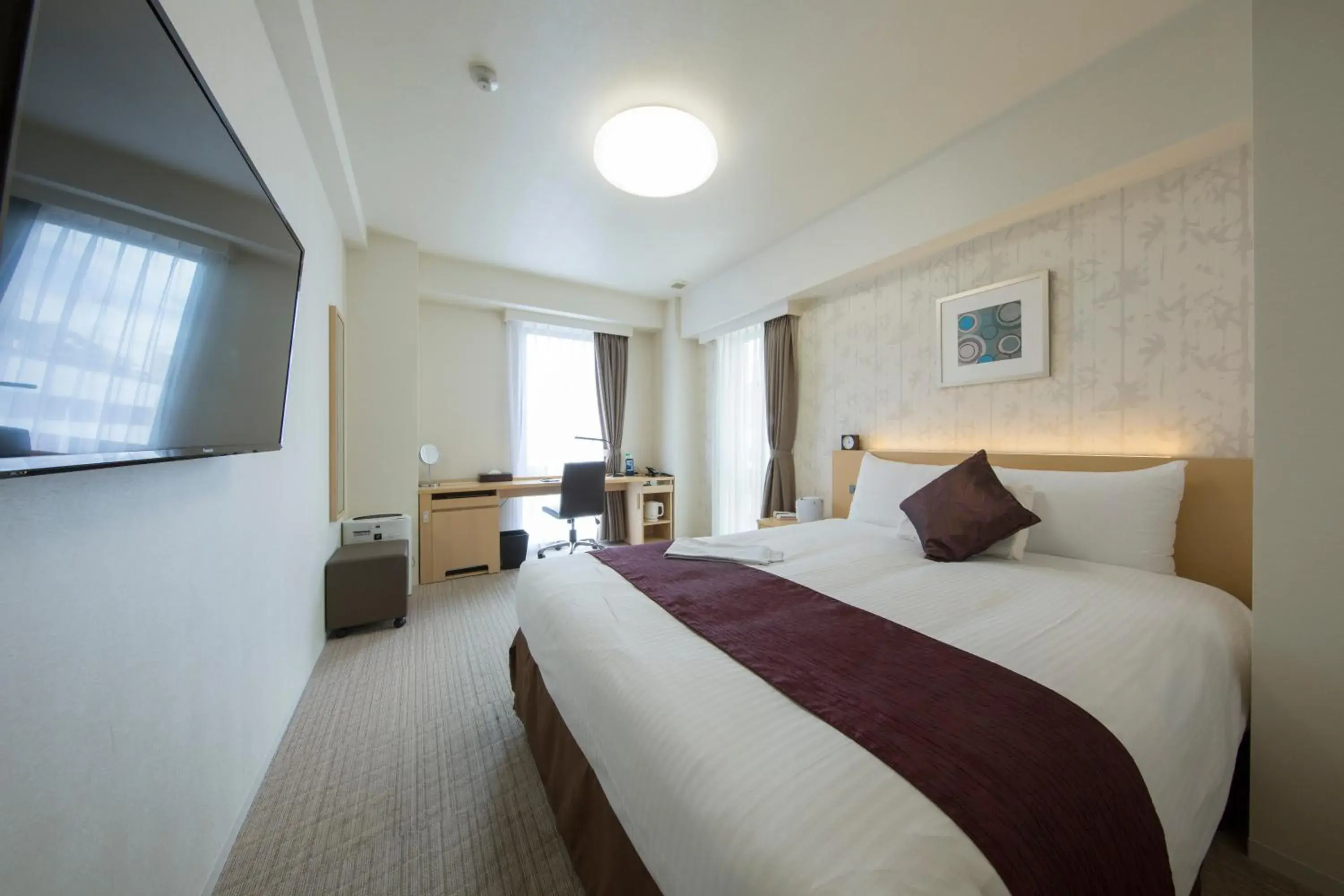 Bed in Shizutetsu Hotel Prezio Shizuoka Ekinan Bed in Shizutetsu Hotel Prezio Shizuoka Ekinan