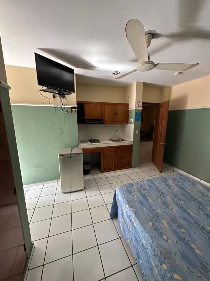 Bed in Blue Pacific Suites