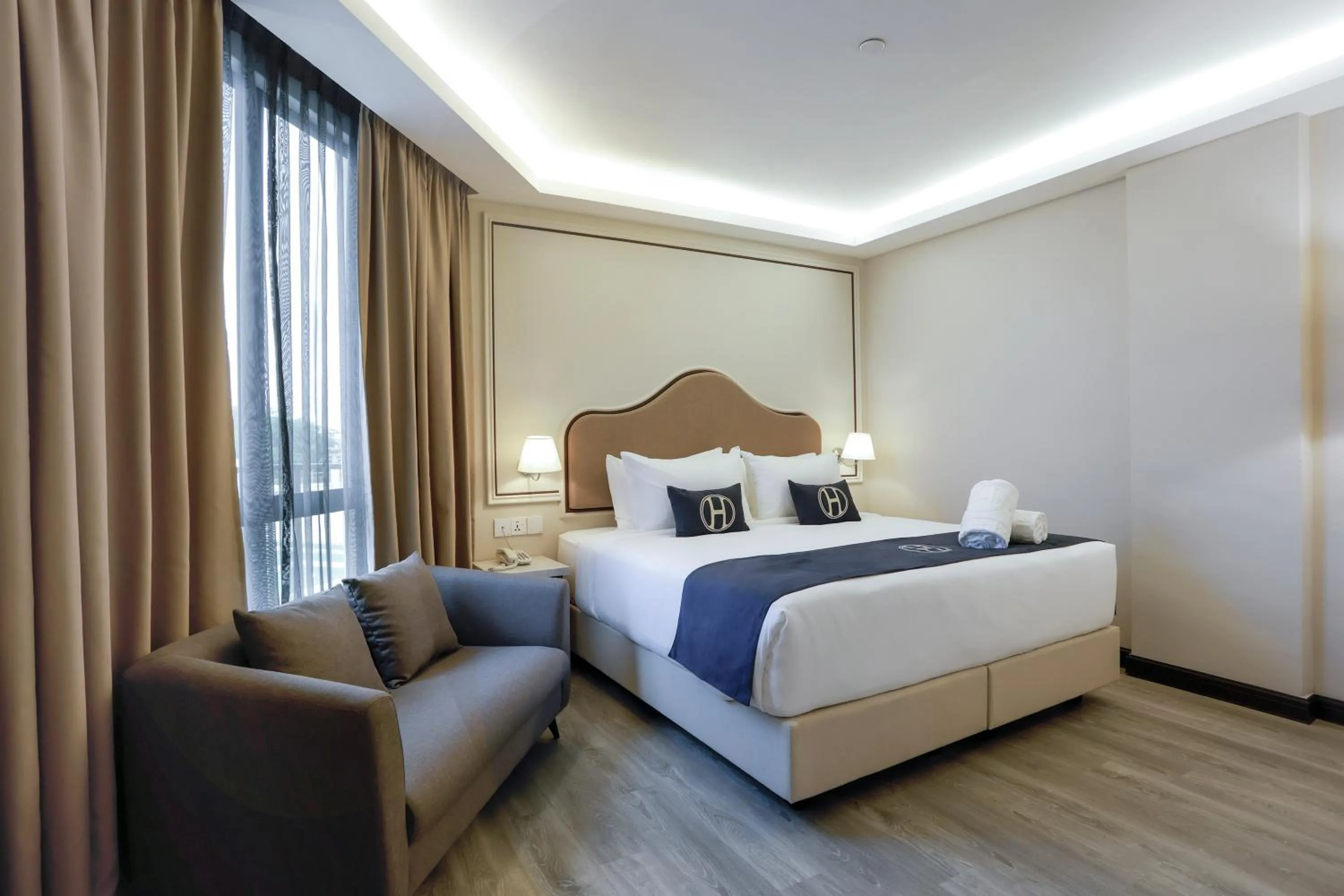 Bed in The Host Hotel