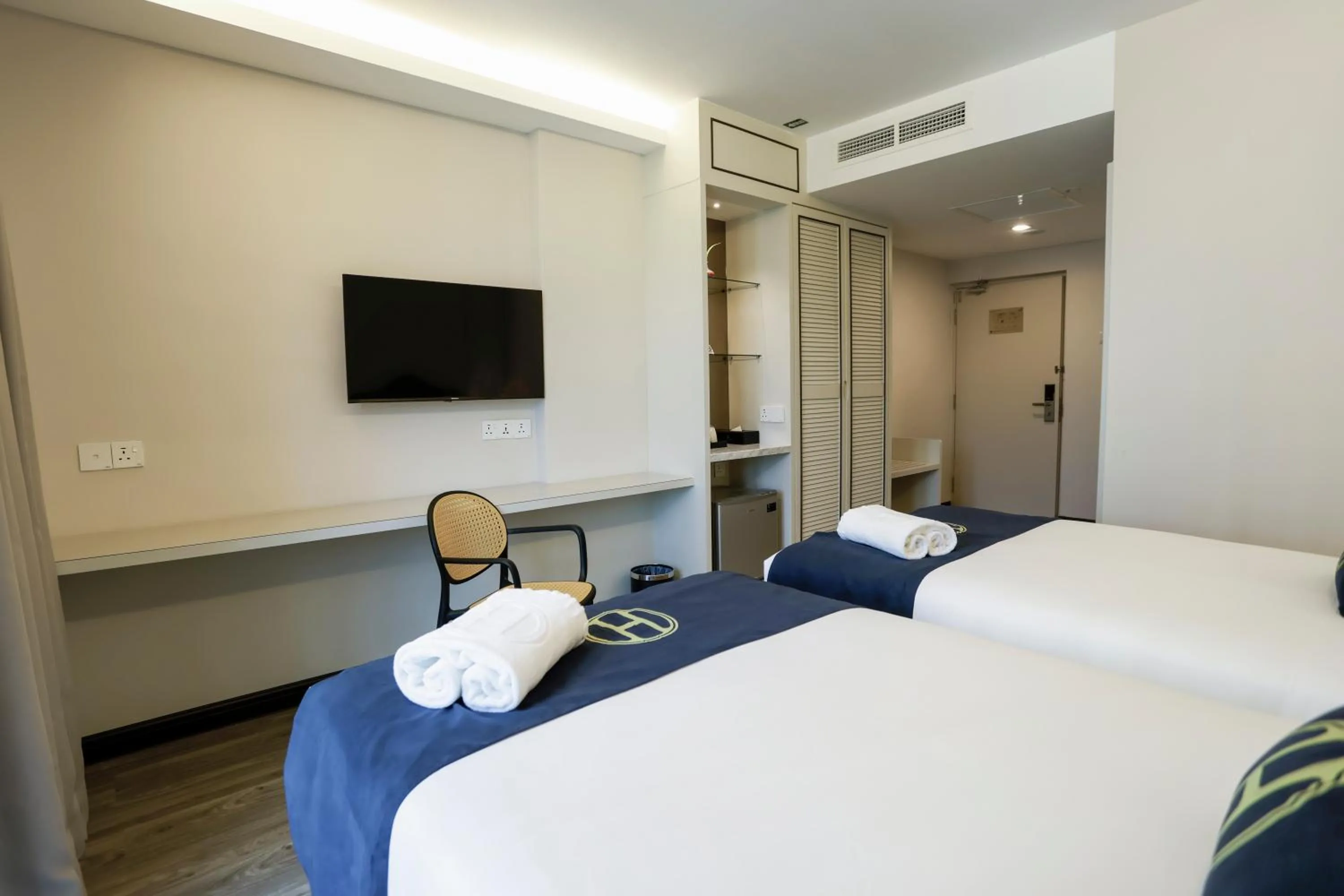 Bed in The Host Hotel