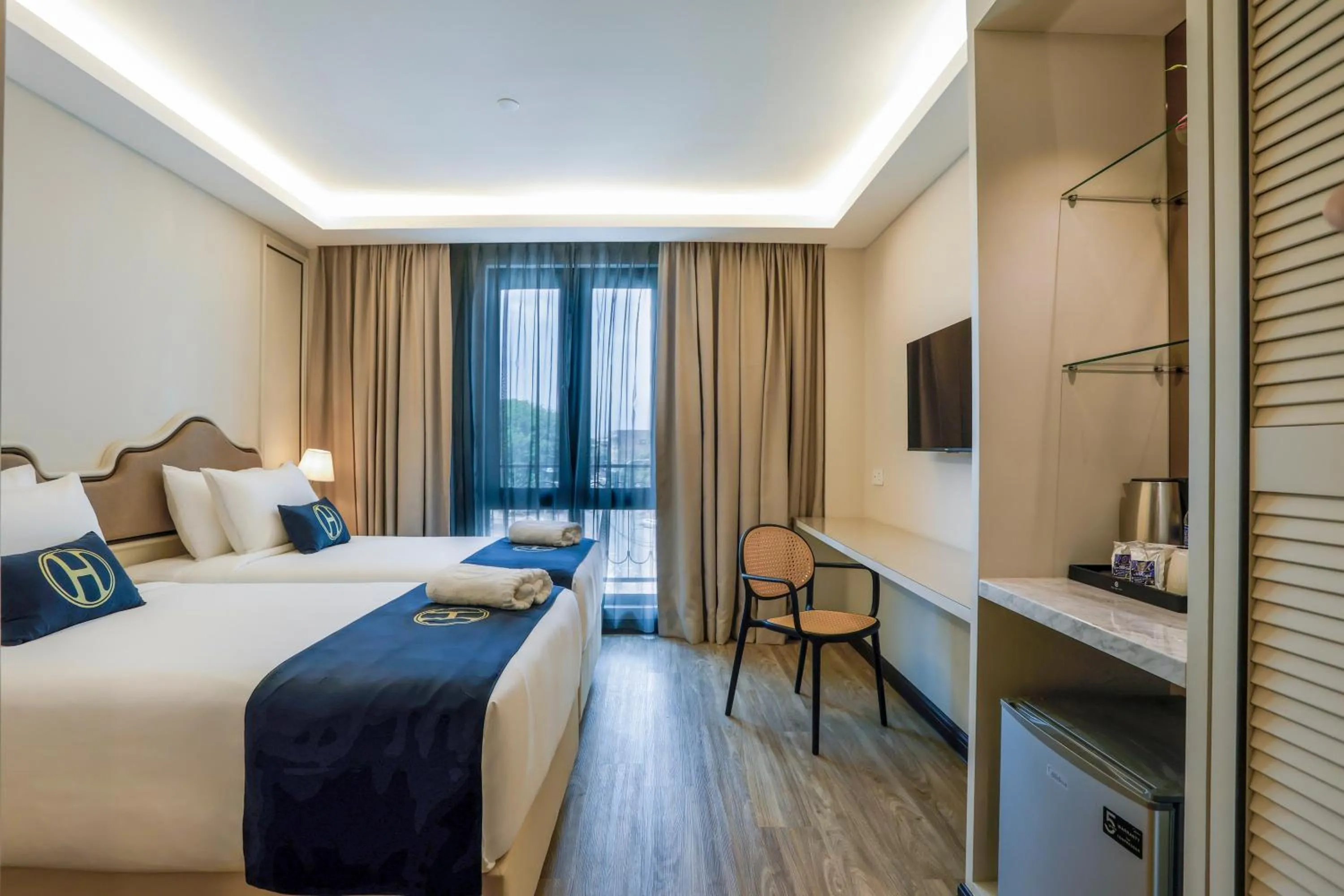 Bed in The Host Hotel