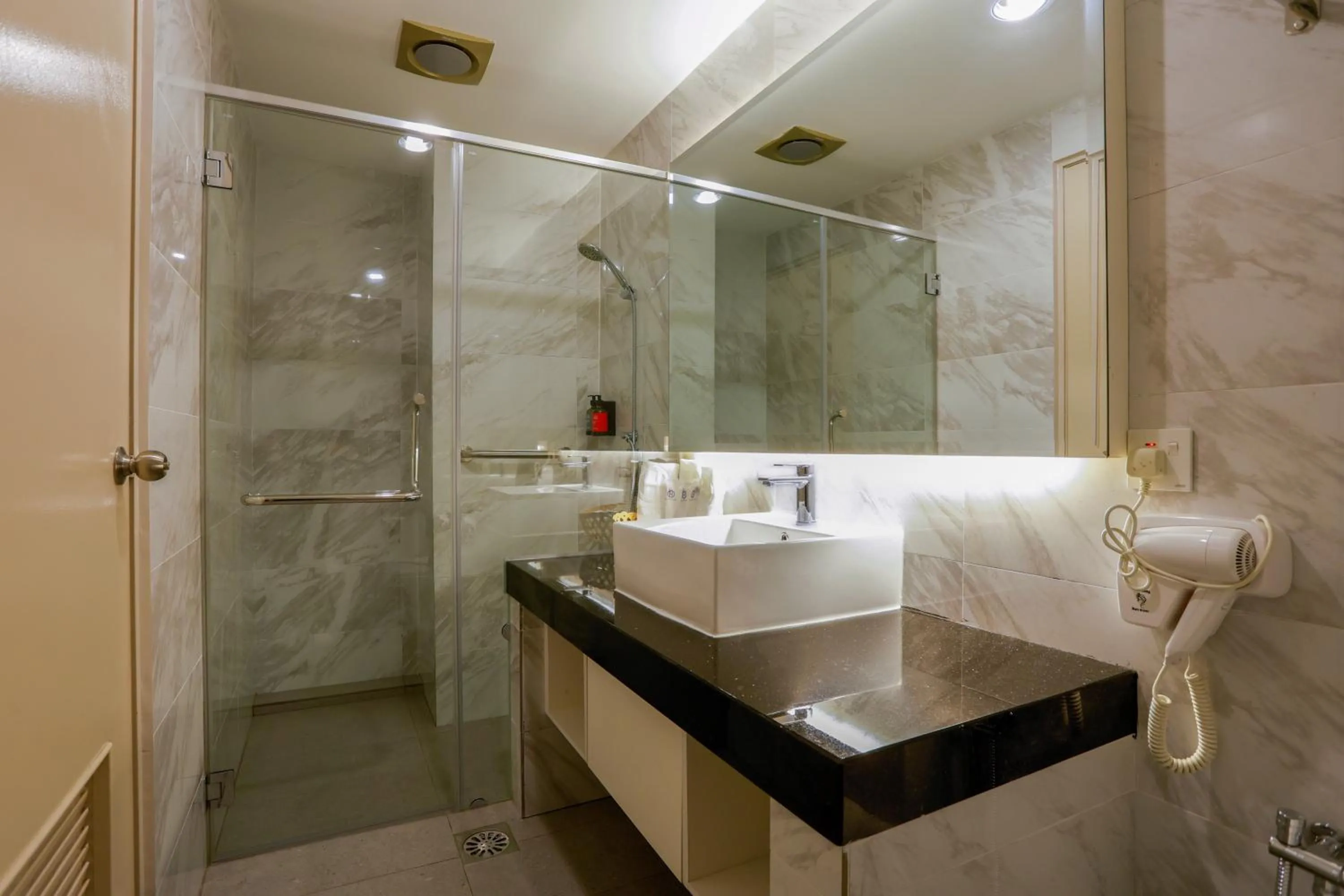 Shower in The Host Hotel