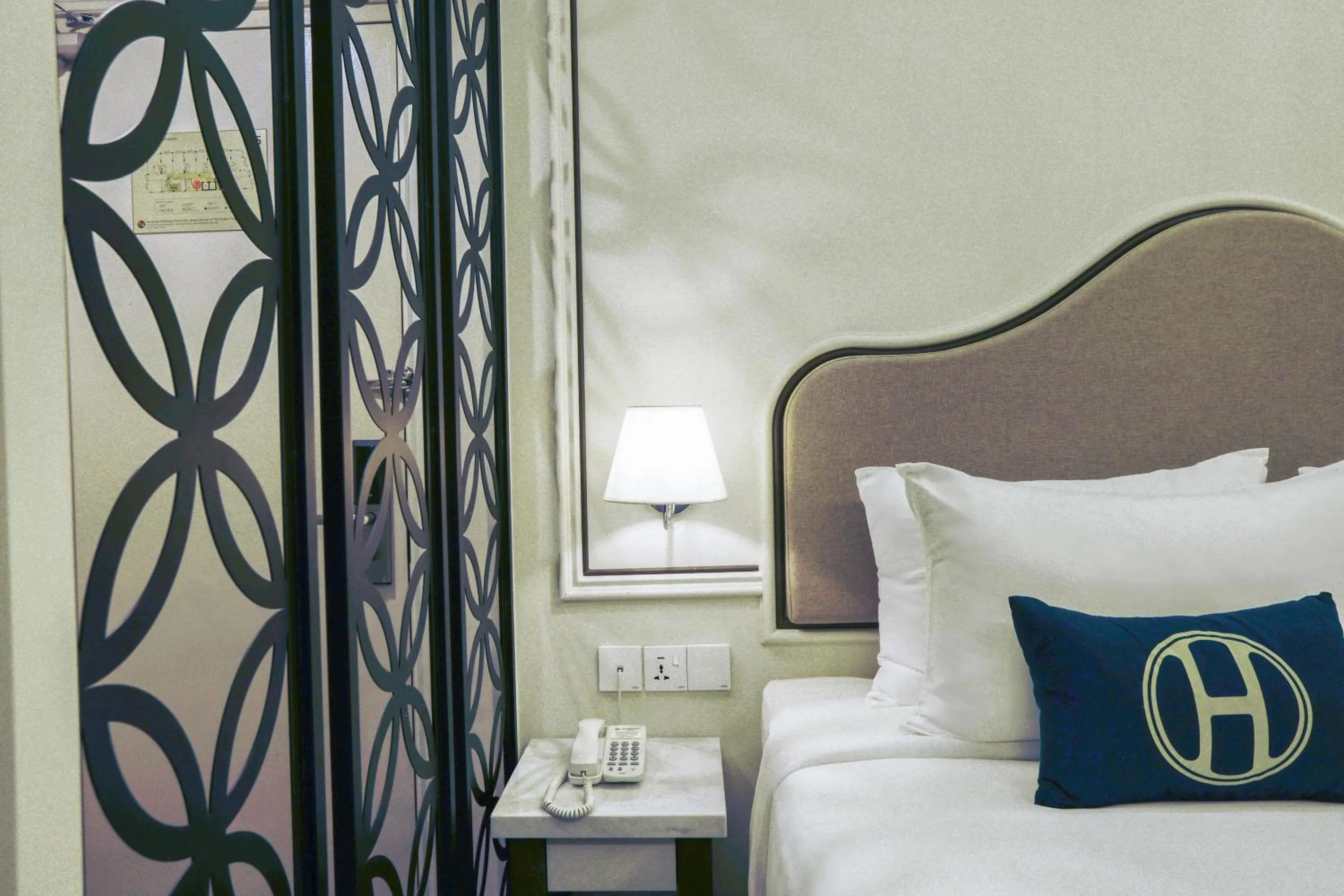 Bed in The Host Hotel