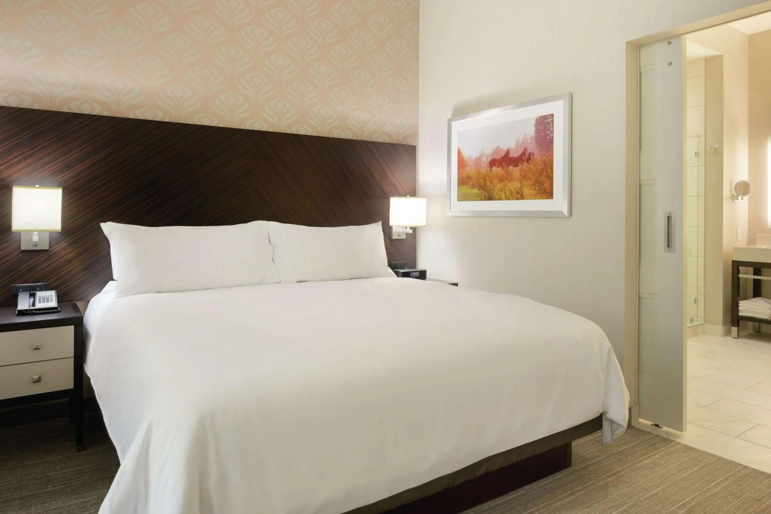 Photo of the whole room, Bed in Embassy Suites Louisville Downtown