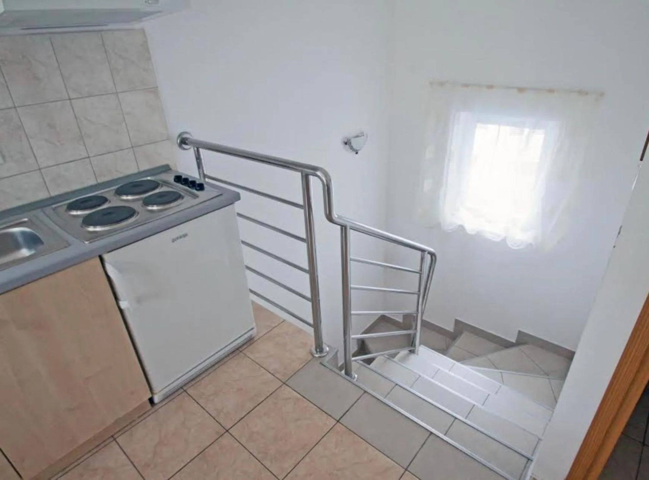 Kitchen or kitchenette in Beachfront Apartments Tamarix