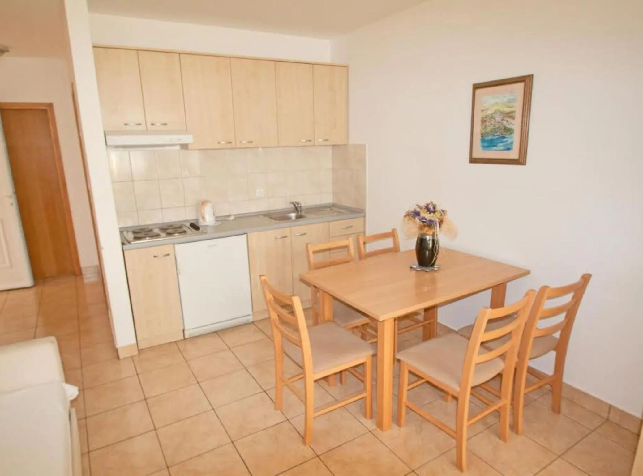 Dining area in Beachfront Apartments Tamarix
