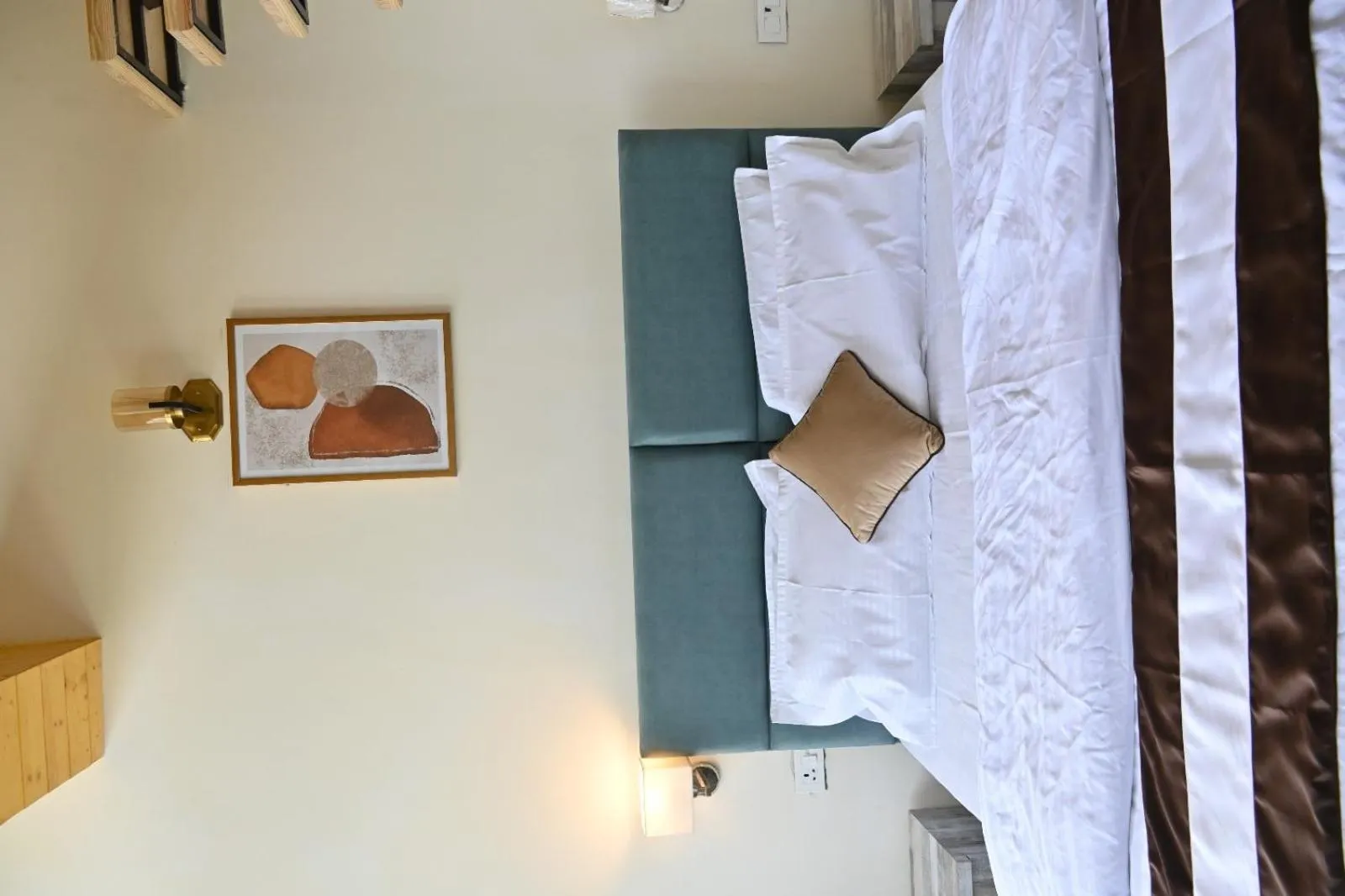 Bed in Prashanti Farms & Resort