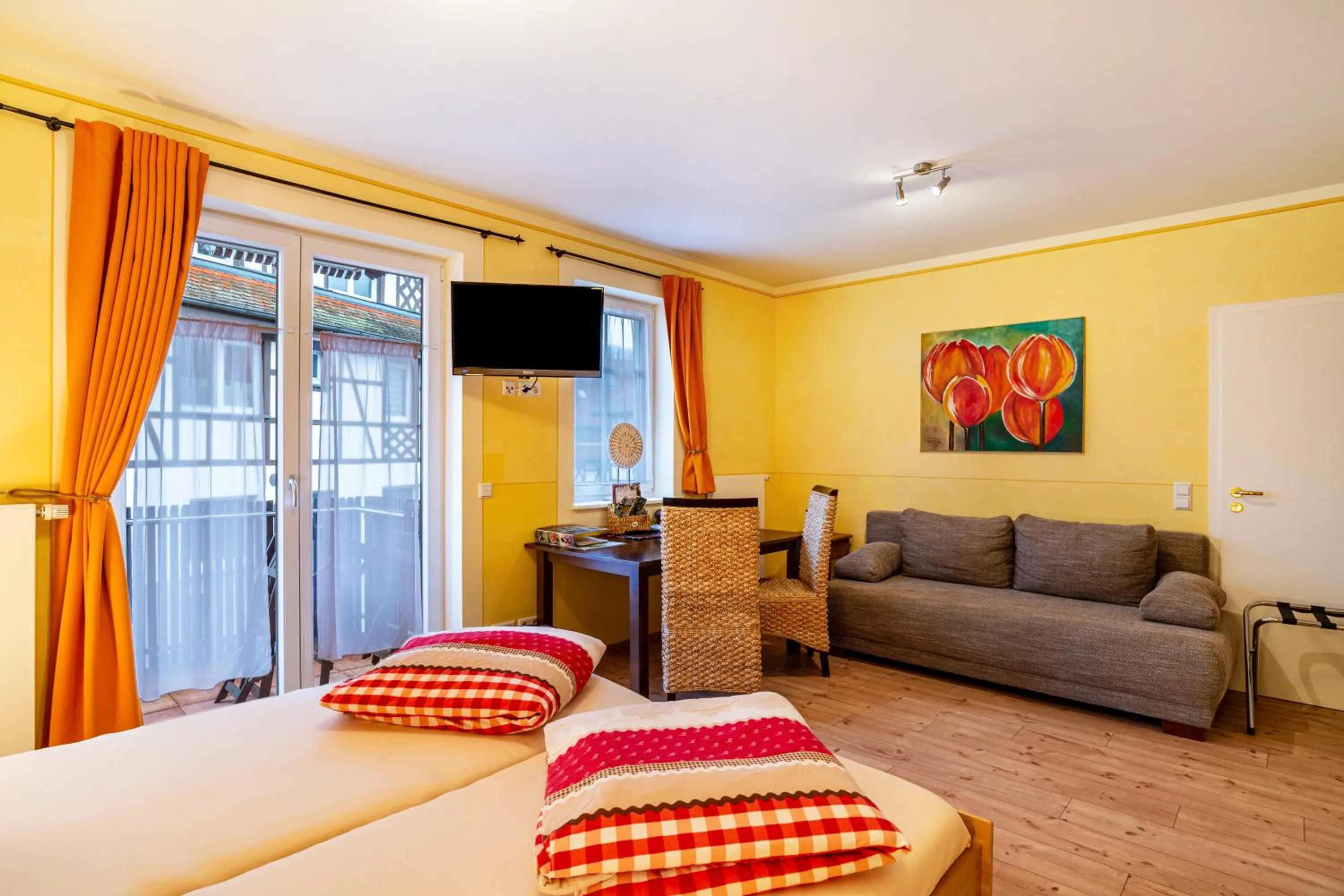 Bed in SCHUSTERjunge Aparthotel