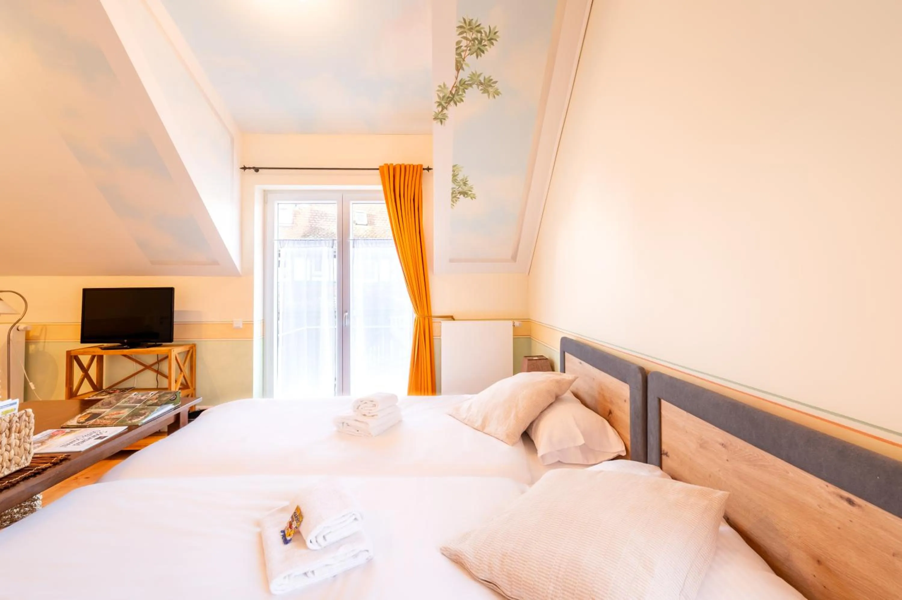 Bed in SCHUSTERjunge Aparthotel I Zentral I Studio Apartments I Küche & Bad I Parkplatz