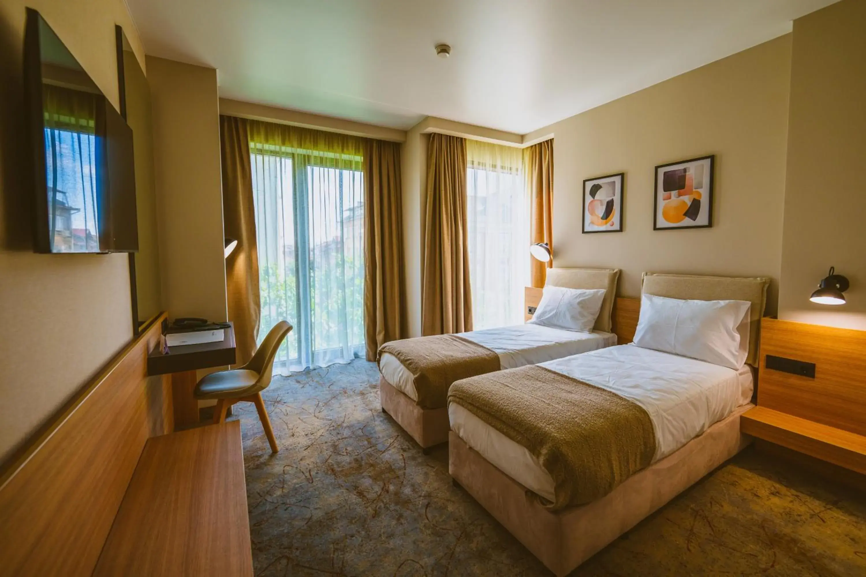 TV and multimedia, Bed in B1 Downtown Hotel TV and multimedia, Bed in B1 Downtown Hotel