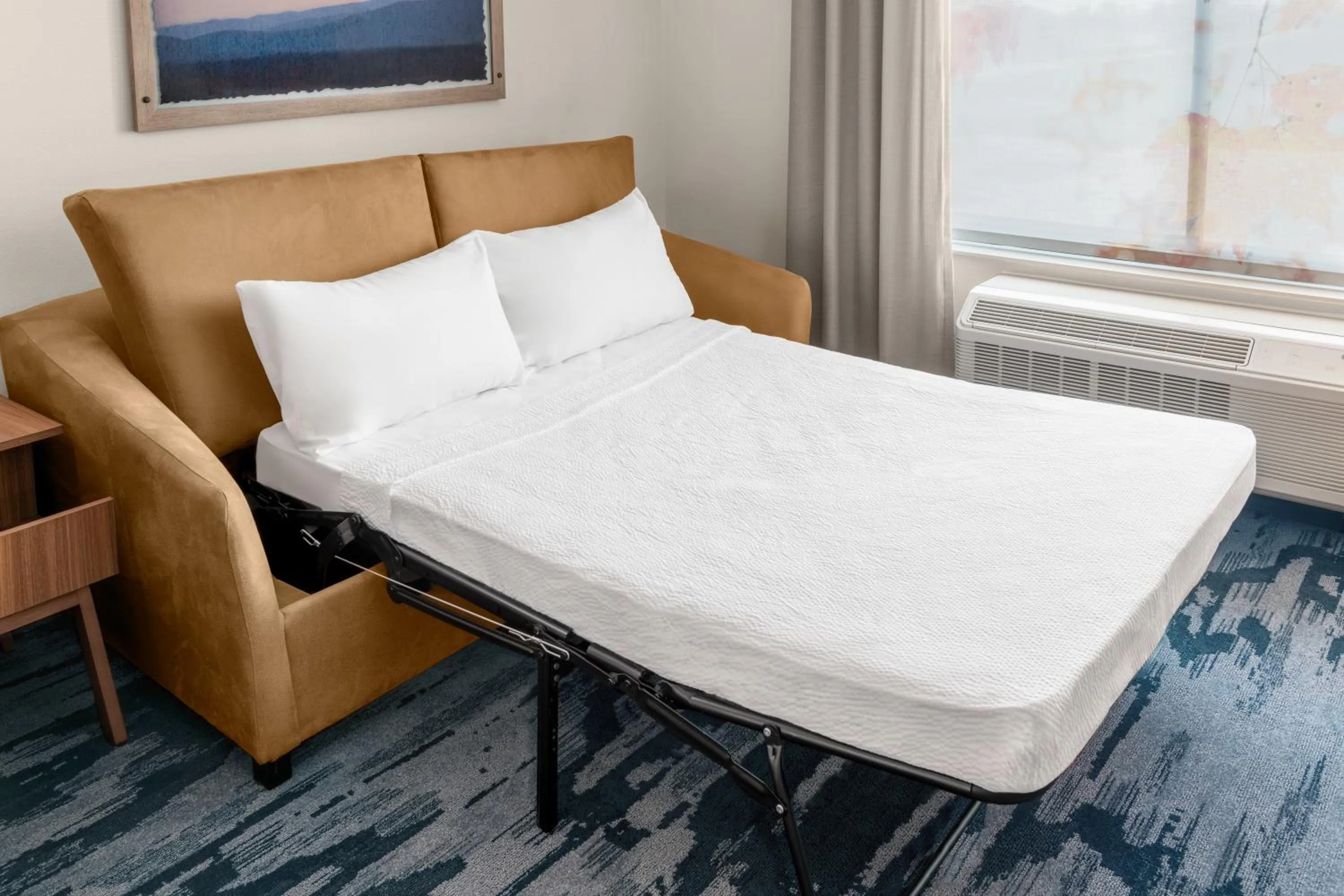 Seating area, Bed in Fairfield by Marriott Inn & Suites Norwalk