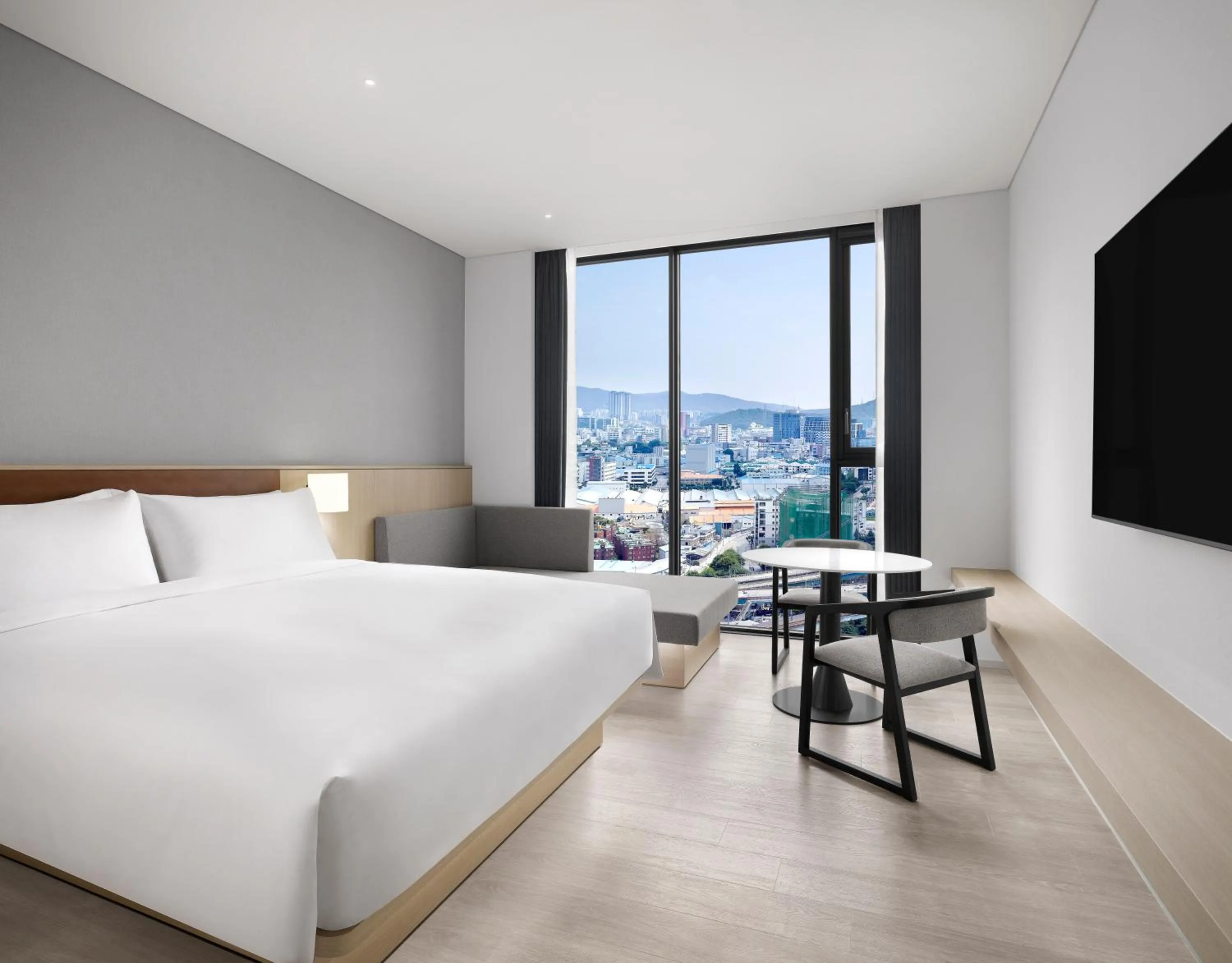 Bed in AC Hotel by Marriott Seoul Geumjeong