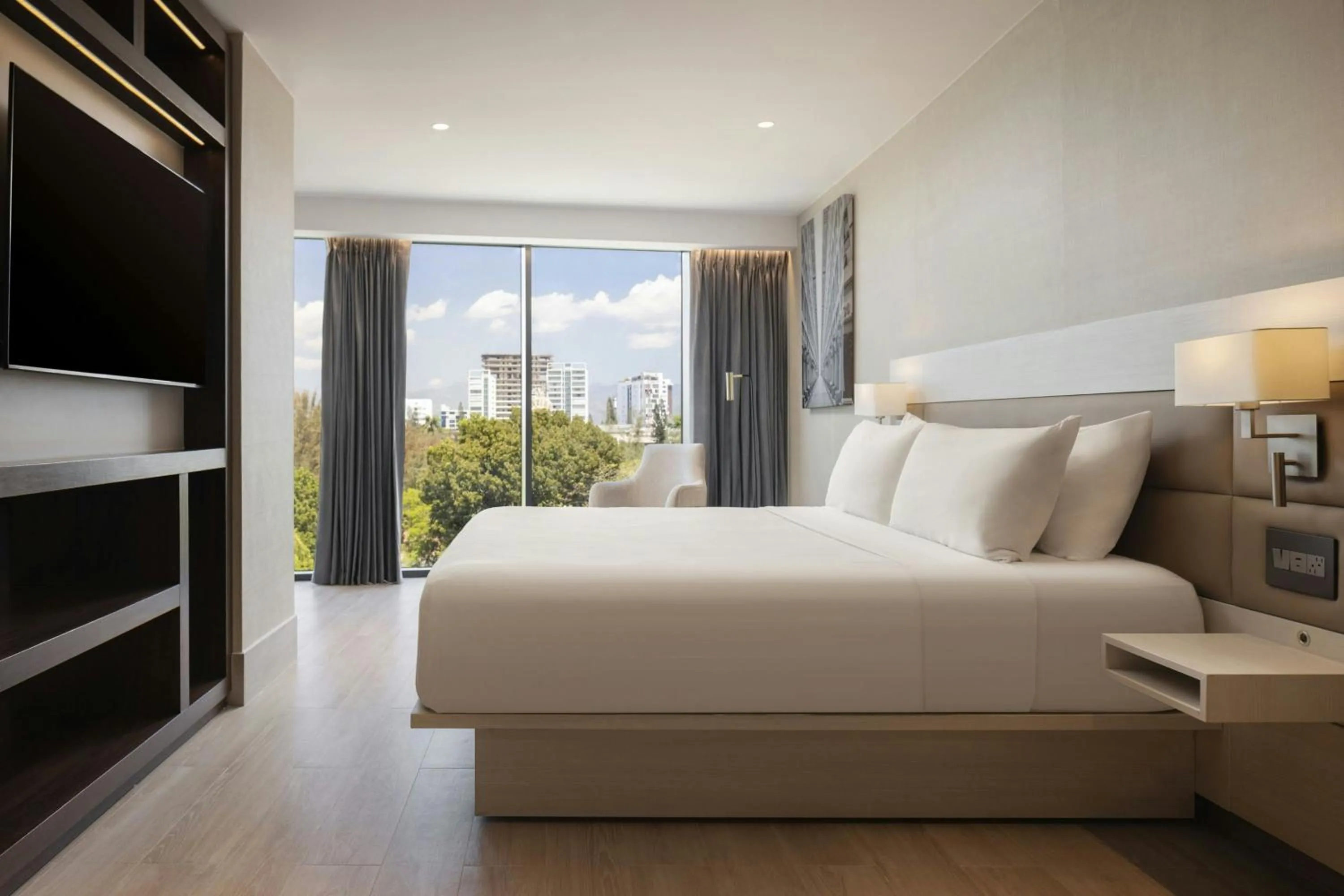 Photo of the whole room, Bed in AC Hotel by Marriott Santiago de los Caballeros