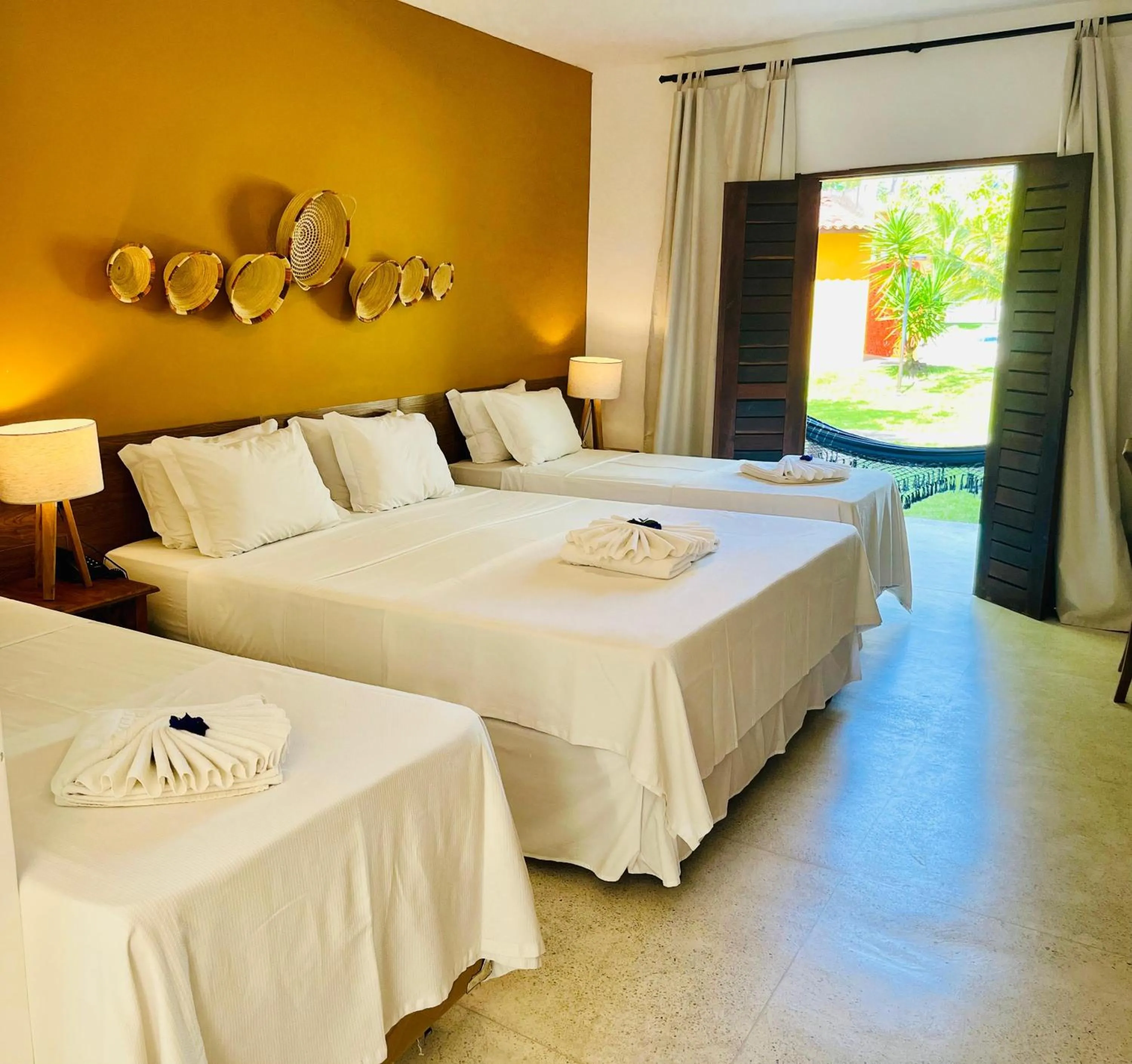 Bed in Angá Beach Hotel