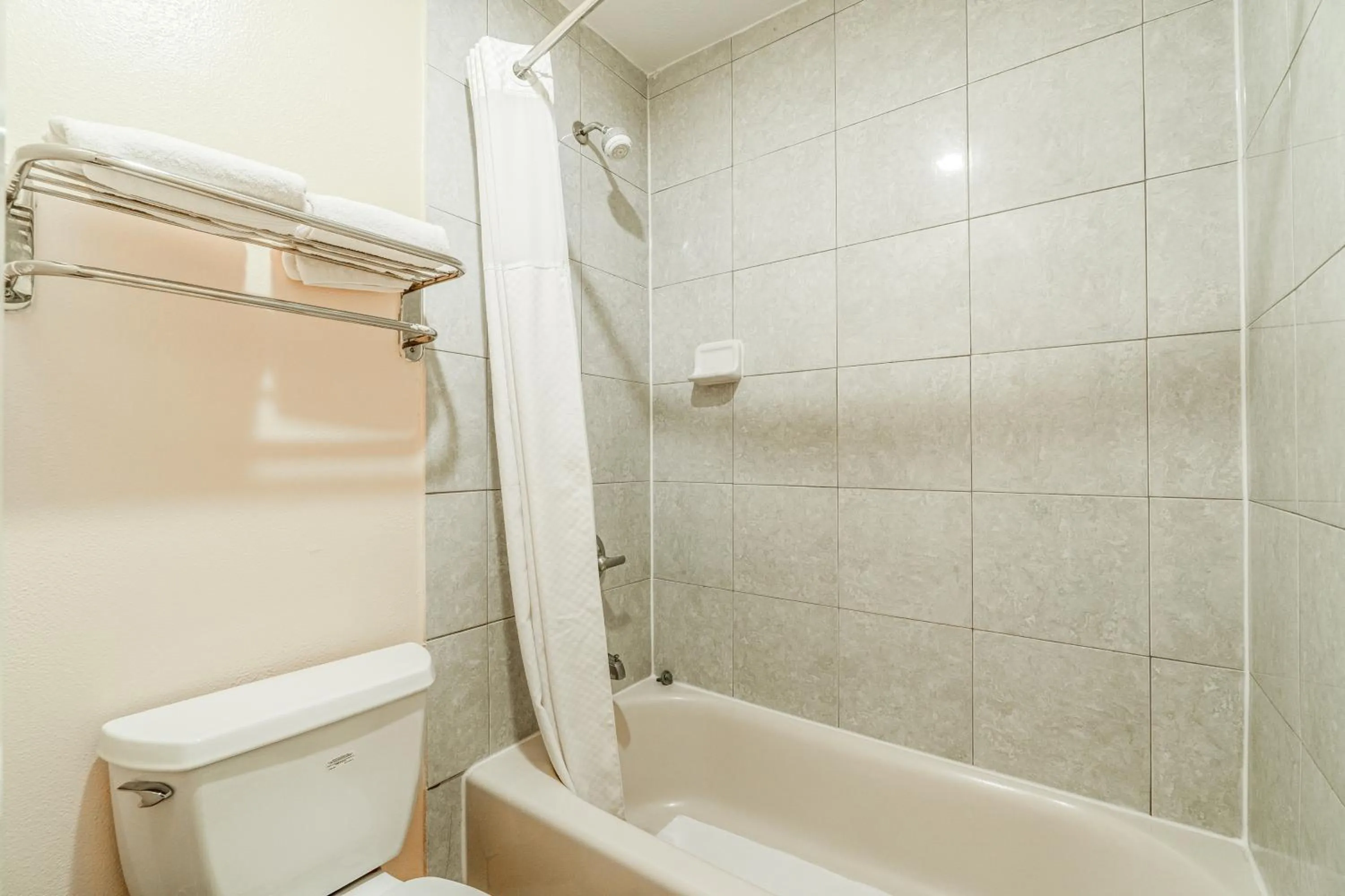 Bathroom in Shale Inn Andrews by OYO