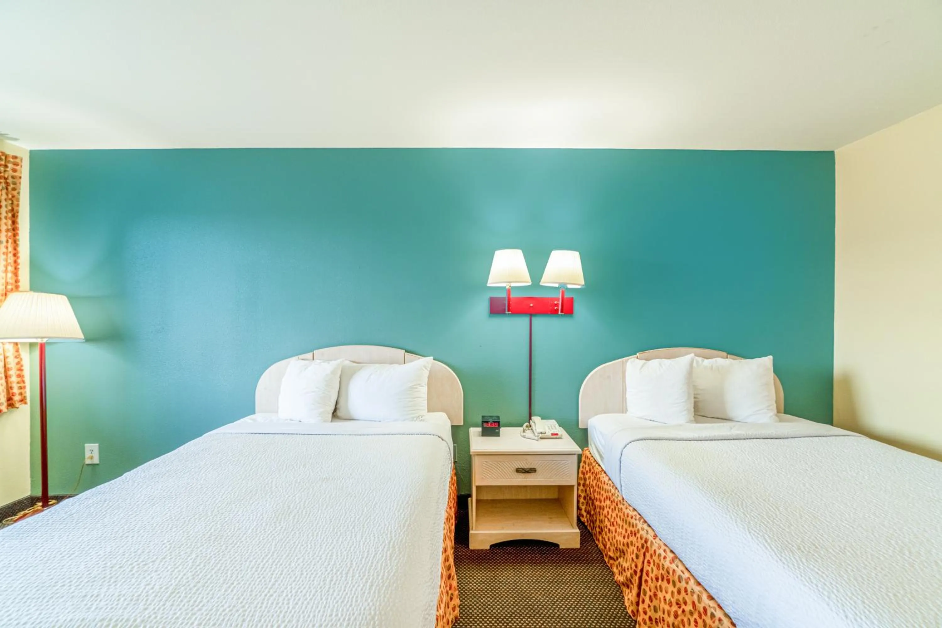 Bedroom, Bed in Shale Inn Andrews by OYO