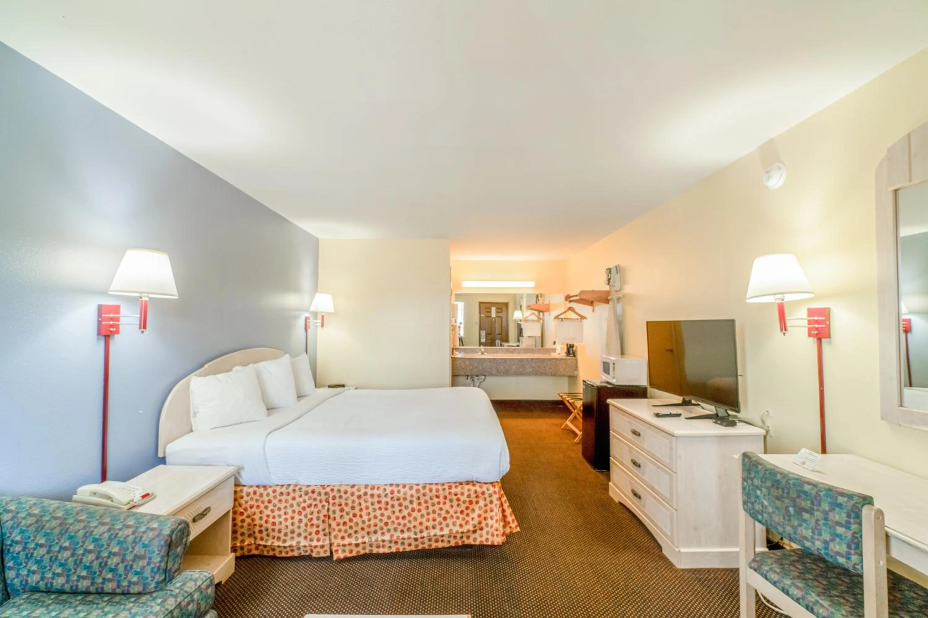 Bedroom, Bed in Shale Inn Andrews by OYO