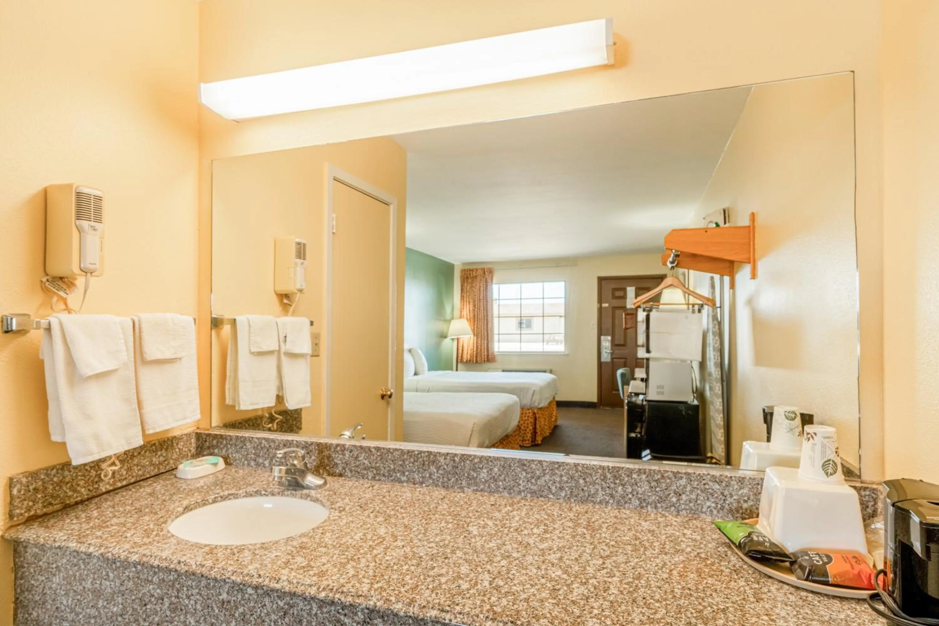 Bathroom, Bed in Shale Inn Andrews by OYO