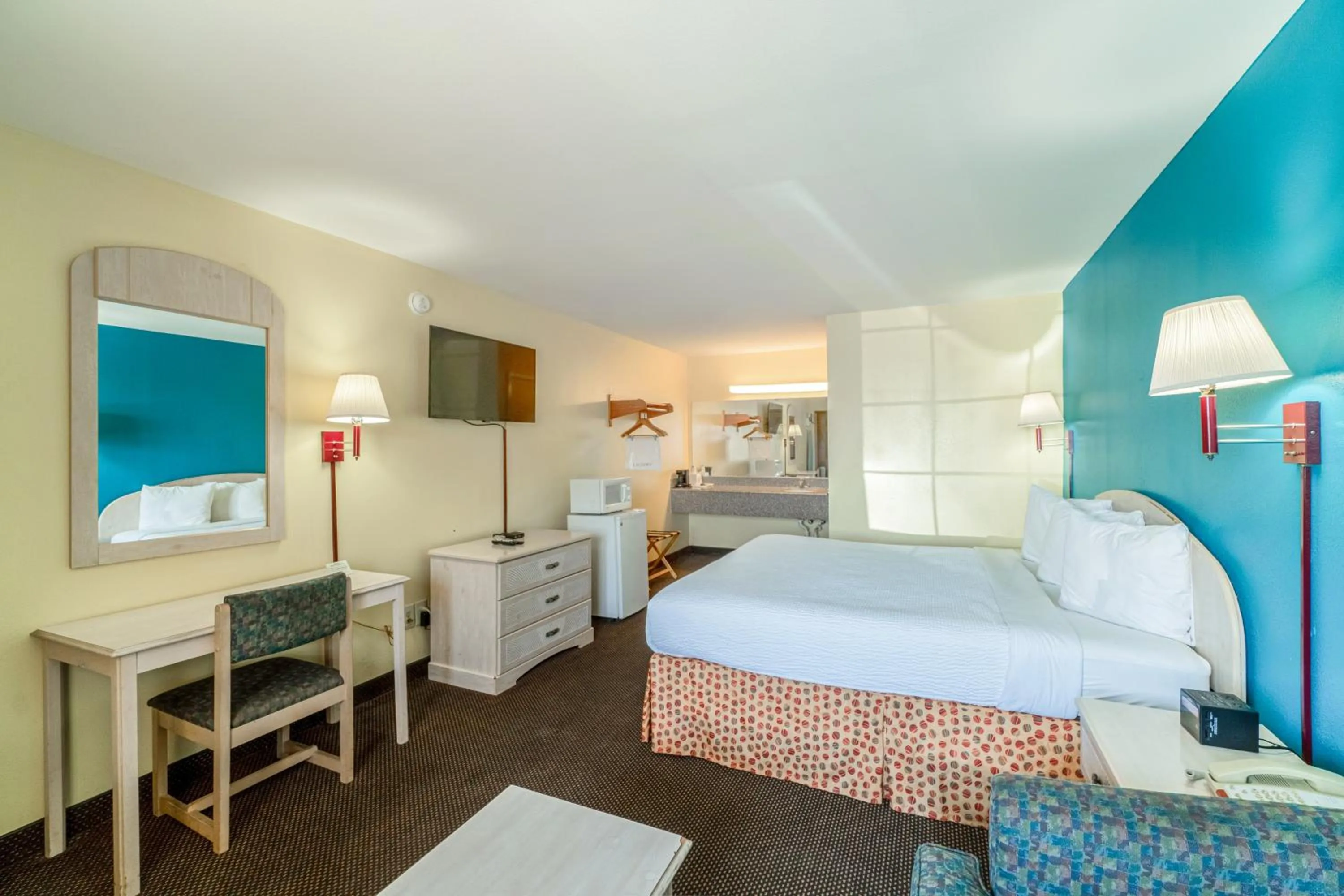 Bedroom, Bed in Shale Inn Andrews by OYO