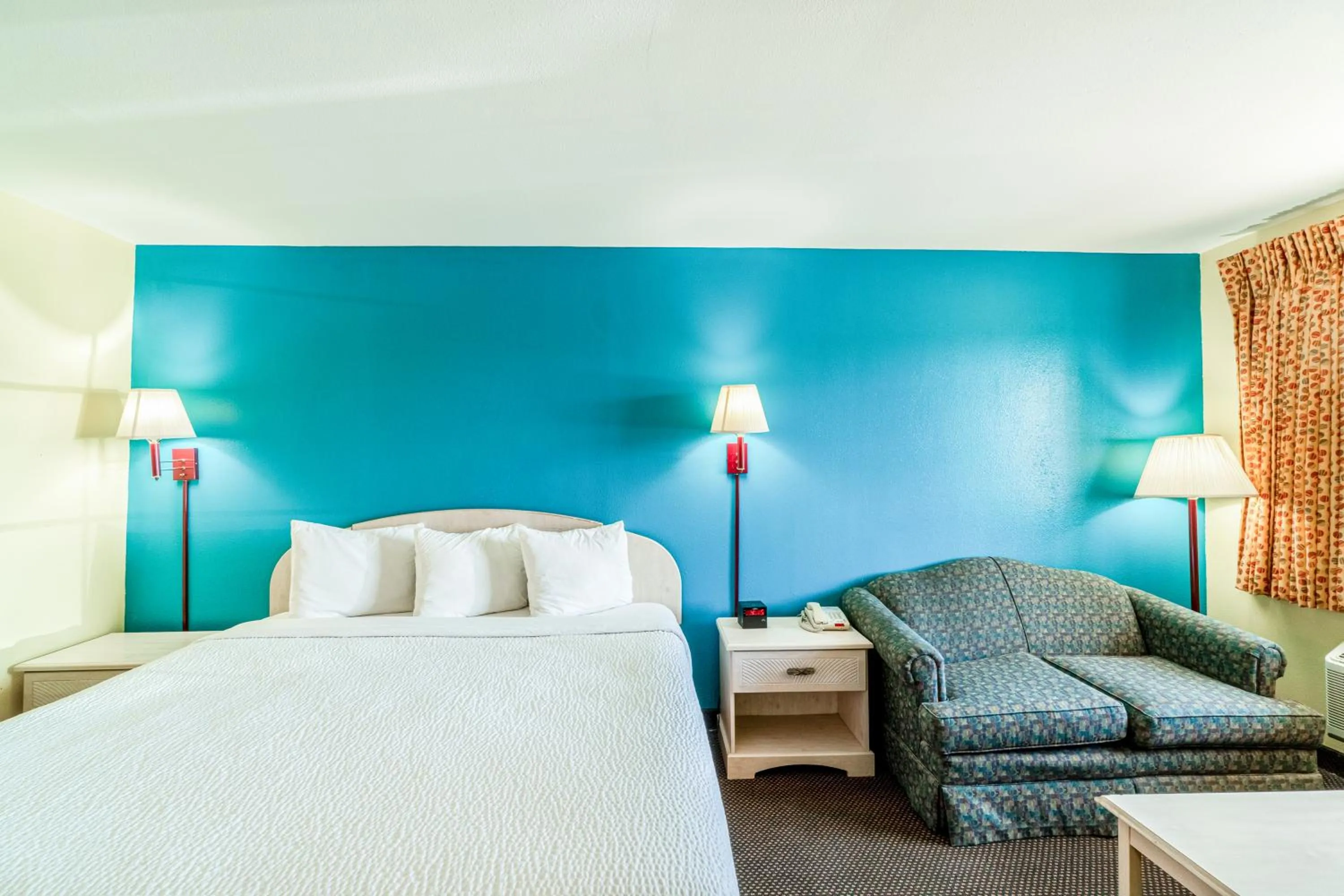 Bedroom, Bed in Shale Inn Andrews by OYO