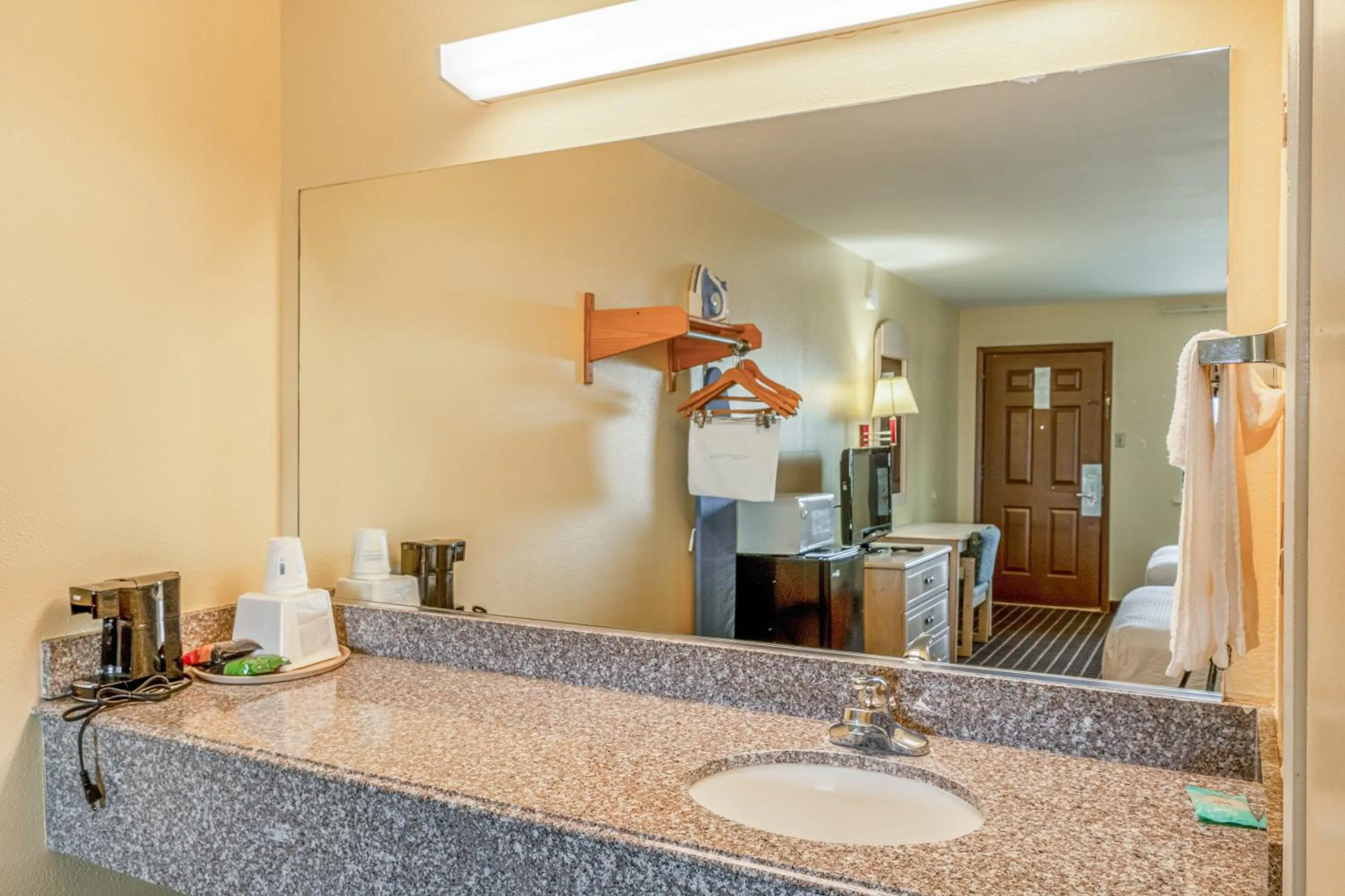 Bathroom in Shale Inn Andrews by OYO