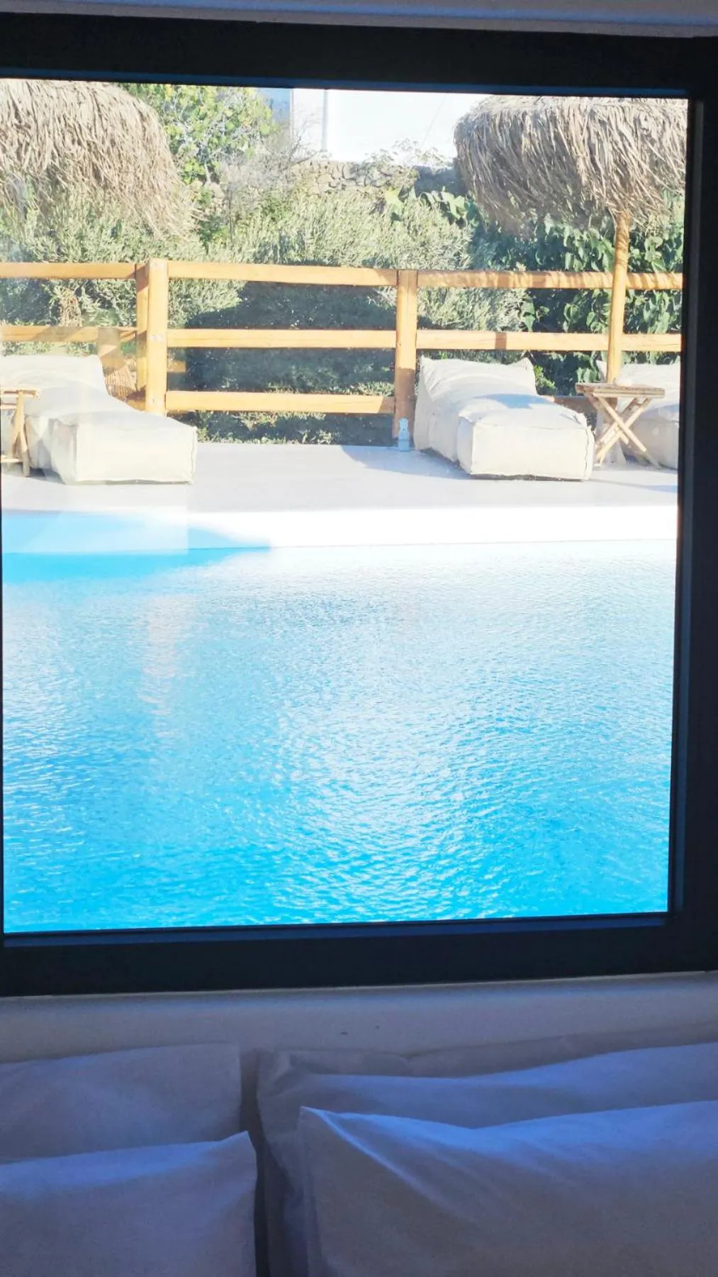 Pool view in ELLI TROPiCAL LUXURY SUITES SUNSET-INFINITY POOL- SEA SIDE-NEAR CENTER PARKING