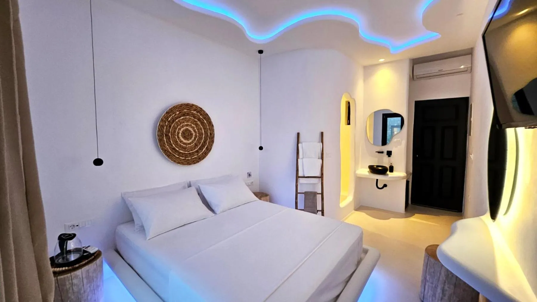 Photo of the whole room, Bed in ELLI TROPiCAL LUXURY SUITES SUNSET-INFINITY POOL- SEA SIDE-NEAR CENTER PARKING