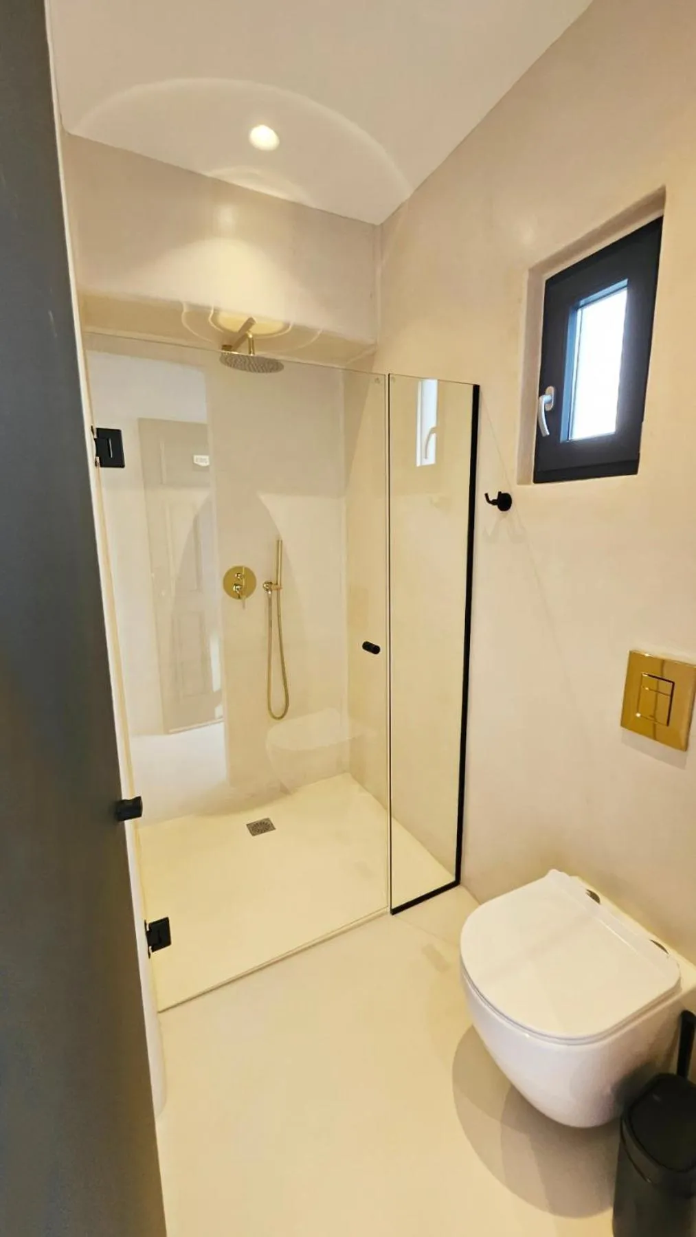 Shower in ELLI TROPiCAL LUXURY SUITES SUNSET-INFINITY POOL- SEA SIDE-NEAR CENTER PARKING