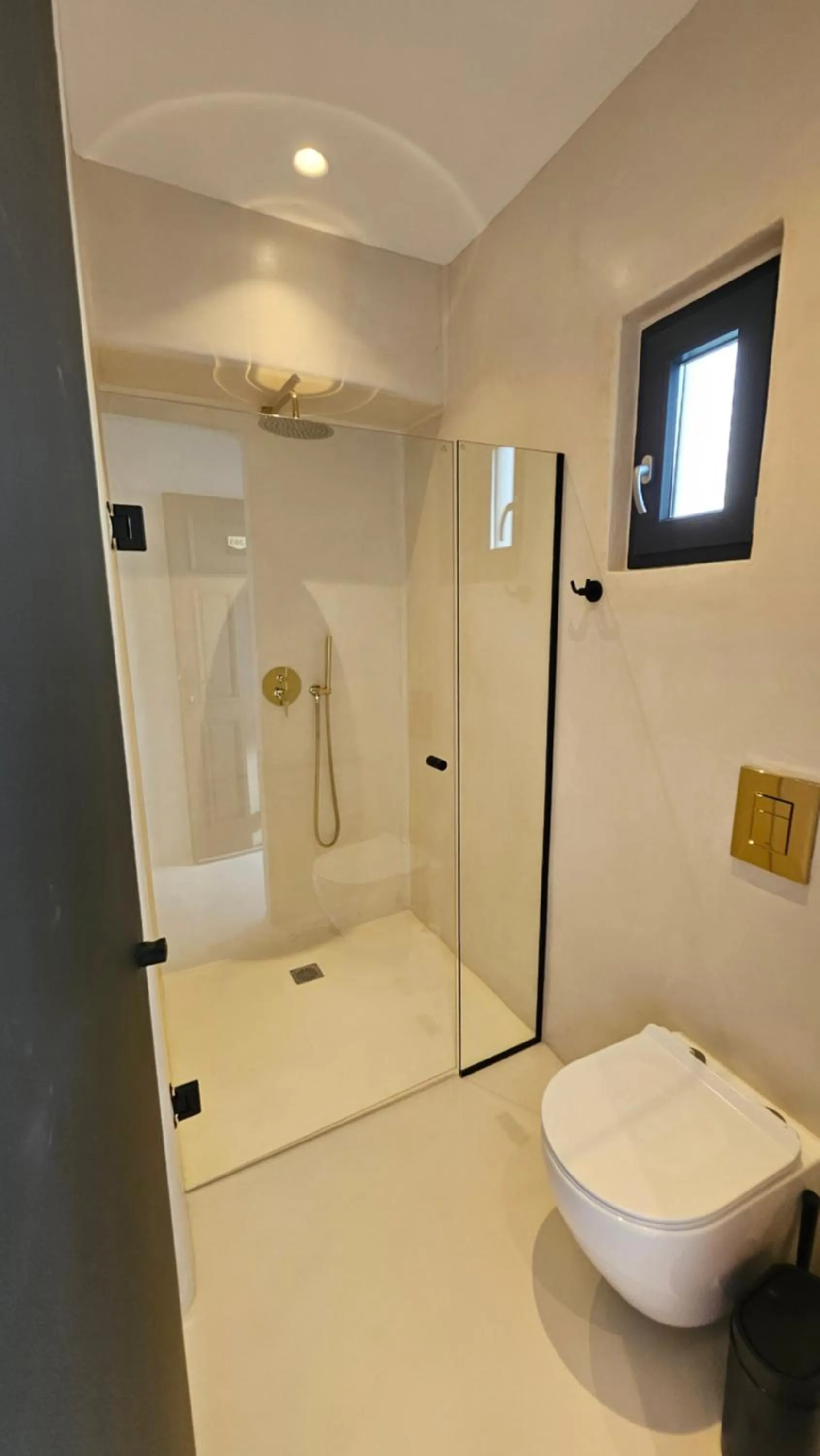 Shower in ELLI TROPiCAL LUXURY SUITES SUNSET-INFINITY POOL- SEA SIDE-NEAR CENTER PARKING