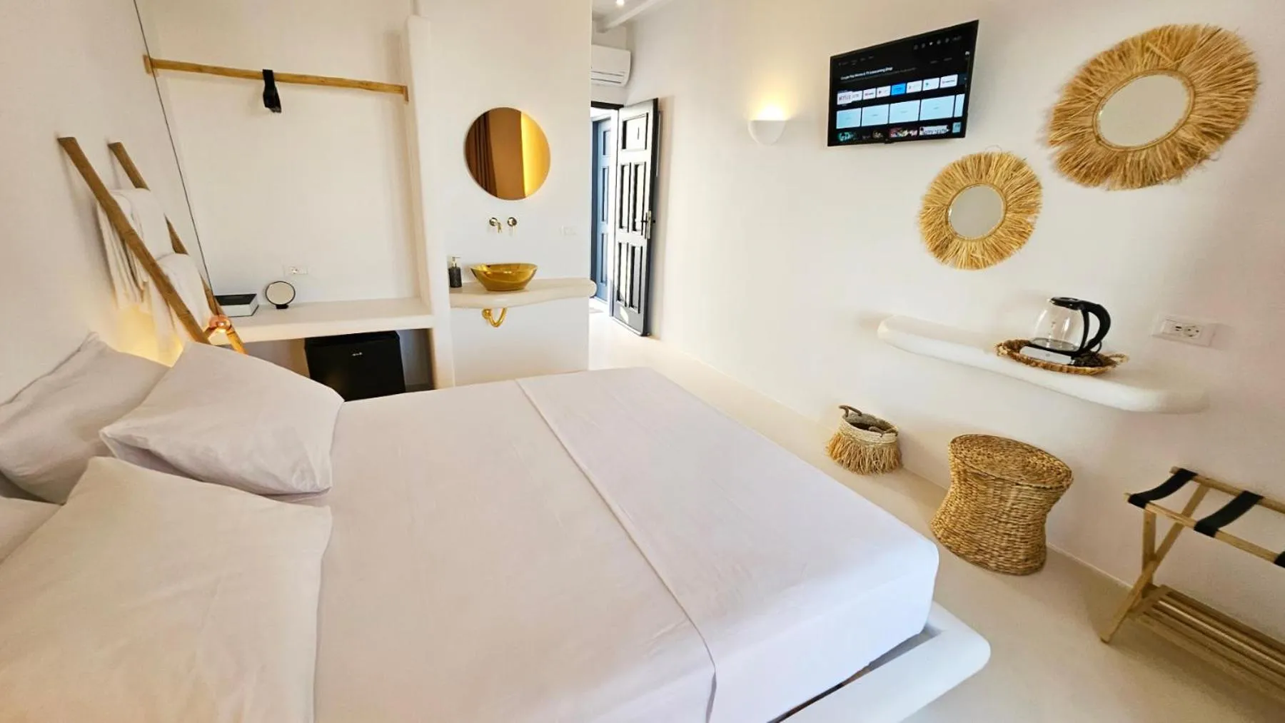 Photo of the whole room, Bed in ELLI TROPiCAL LUXURY SUITES SUNSET-INFINITY POOL- SEA SIDE-NEAR CENTER PARKING