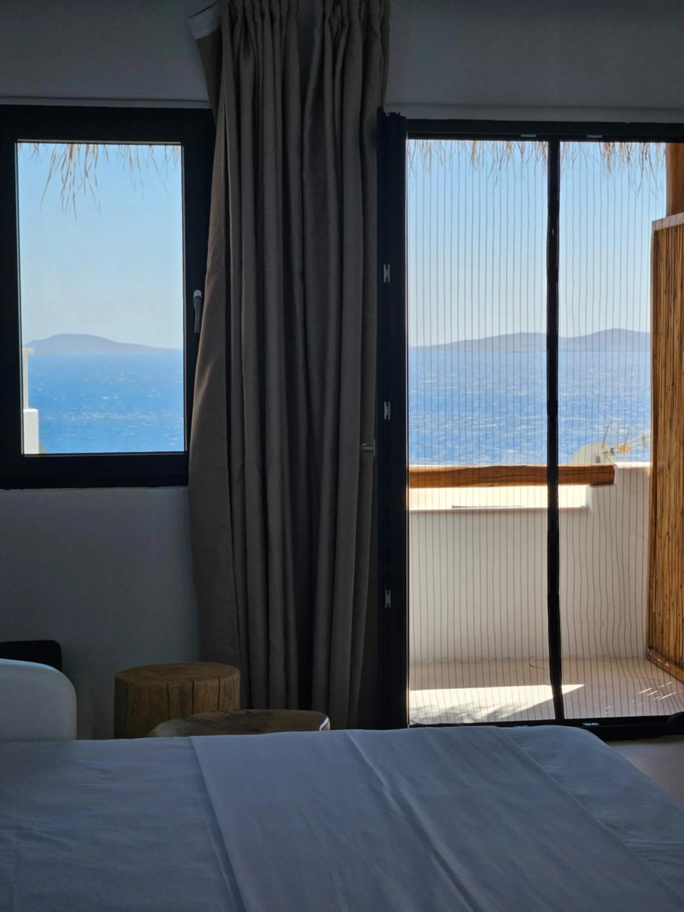 View (from property/room), Bed in ELLI TROPiCAL LUXURY SUITES SUNSET-INFINITY POOL- SEA SIDE-NEAR CENTER PARKING
