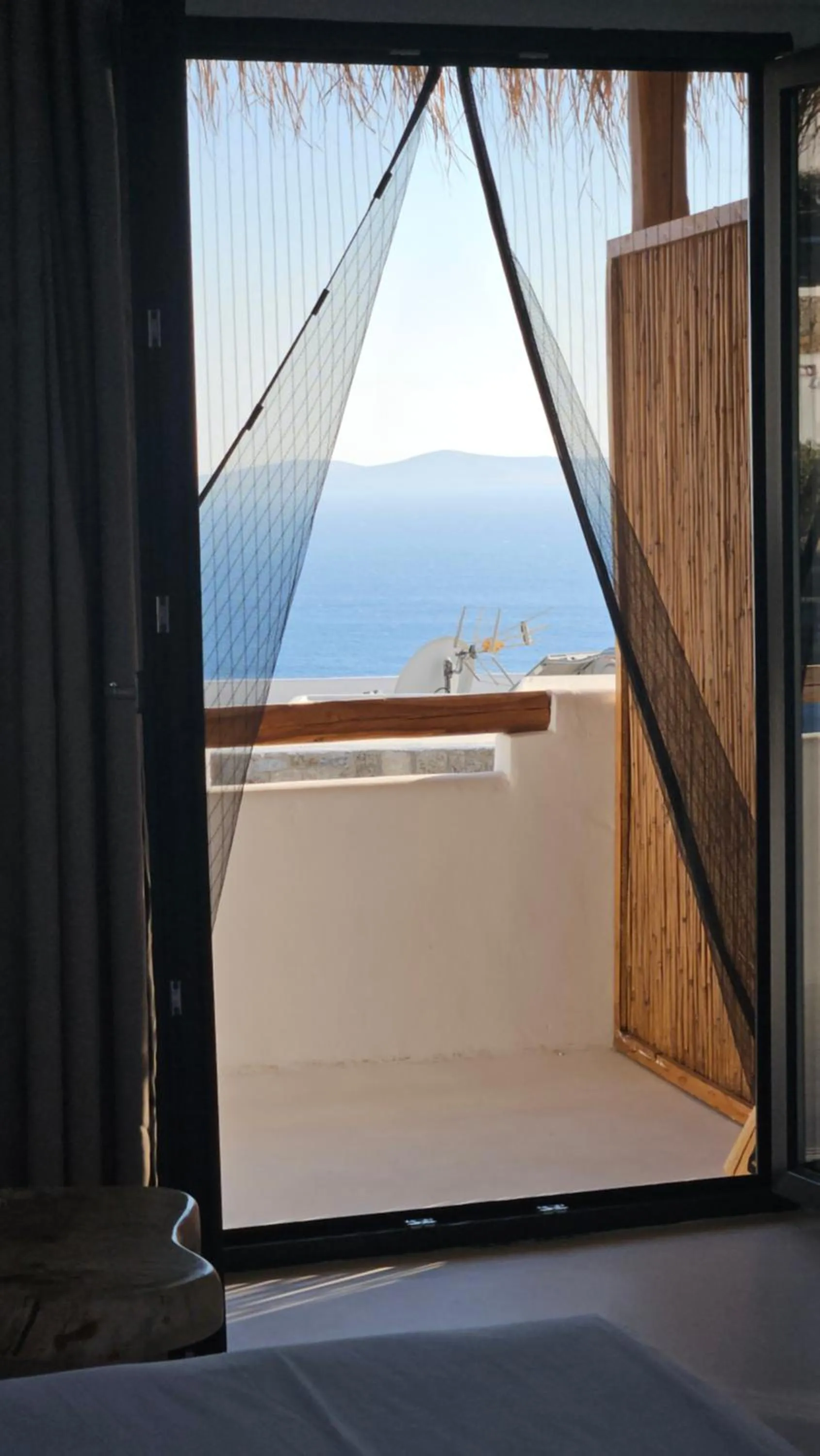 View (from property/room), Bed in ELLI TROPiCAL LUXURY SUITES SUNSET-INFINITY POOL- SEA SIDE-NEAR CENTER PARKING