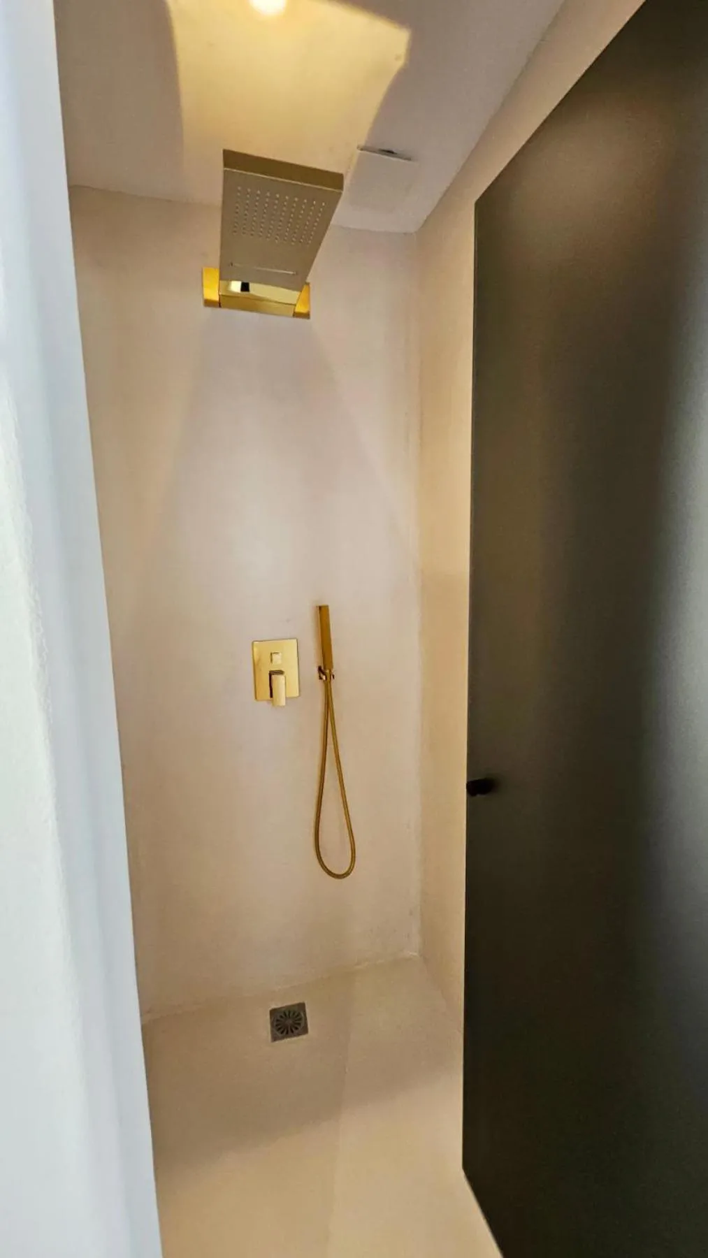 Shower in ELLI TROPiCAL LUXURY SUITES SUNSET-INFINITY POOL- SEA SIDE-NEAR CENTER PARKING