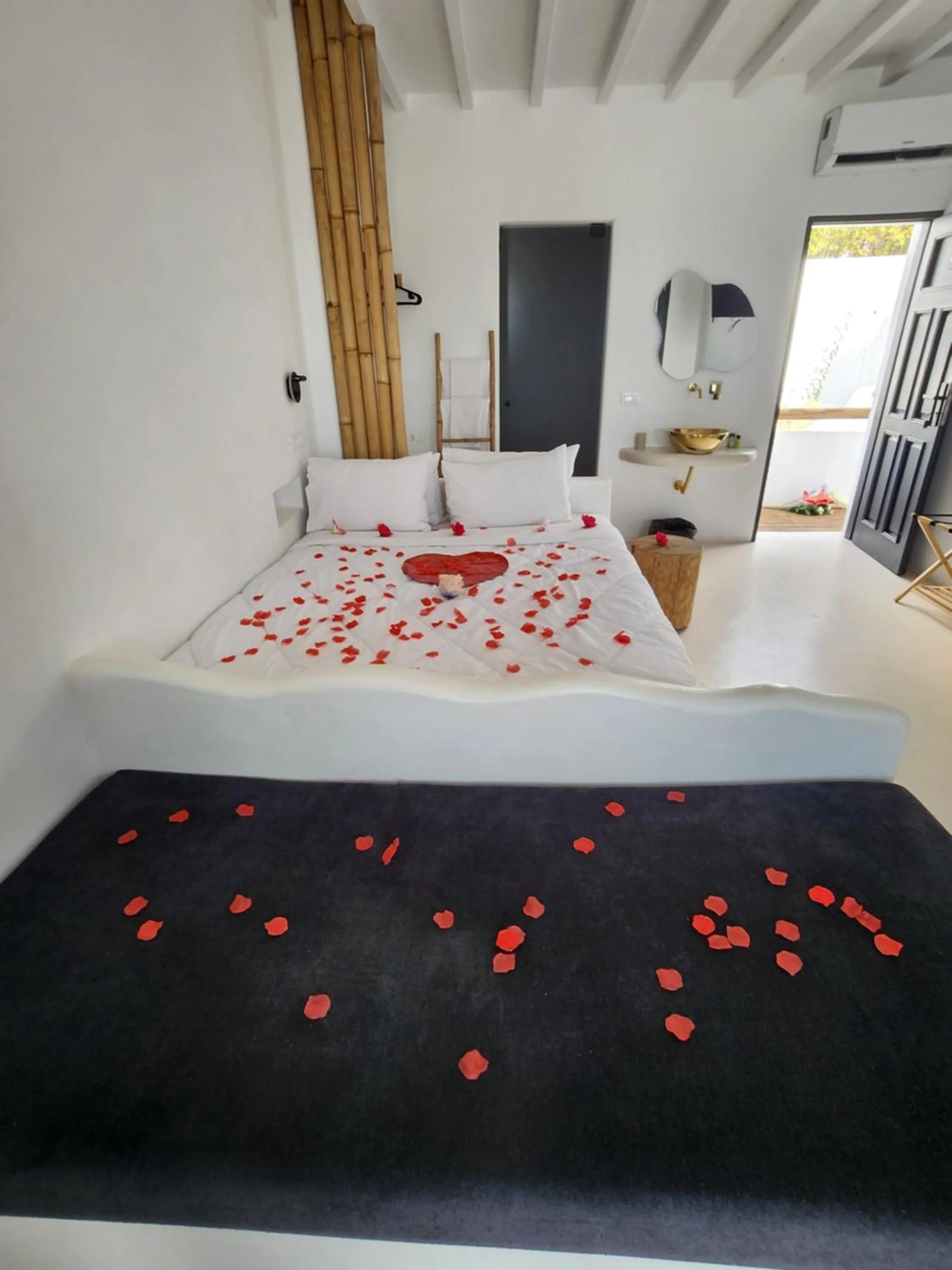 Decorative detail, Bed in ELLI TROPiCAL LUXURY SUITES SUNSET-INFINITY POOL- SEA SIDE-NEAR CENTER PARKING