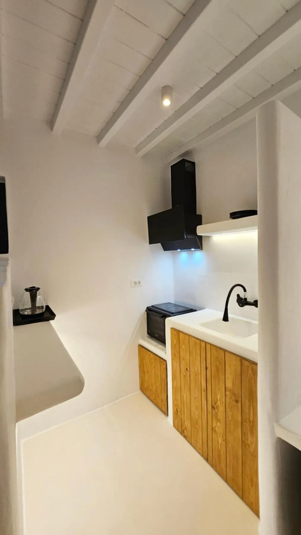 Kitchen or kitchenette in ELLI TROPiCAL LUXURY SUITES SUNSET-INFINITY POOL- SEA SIDE-NEAR CENTER PARKING