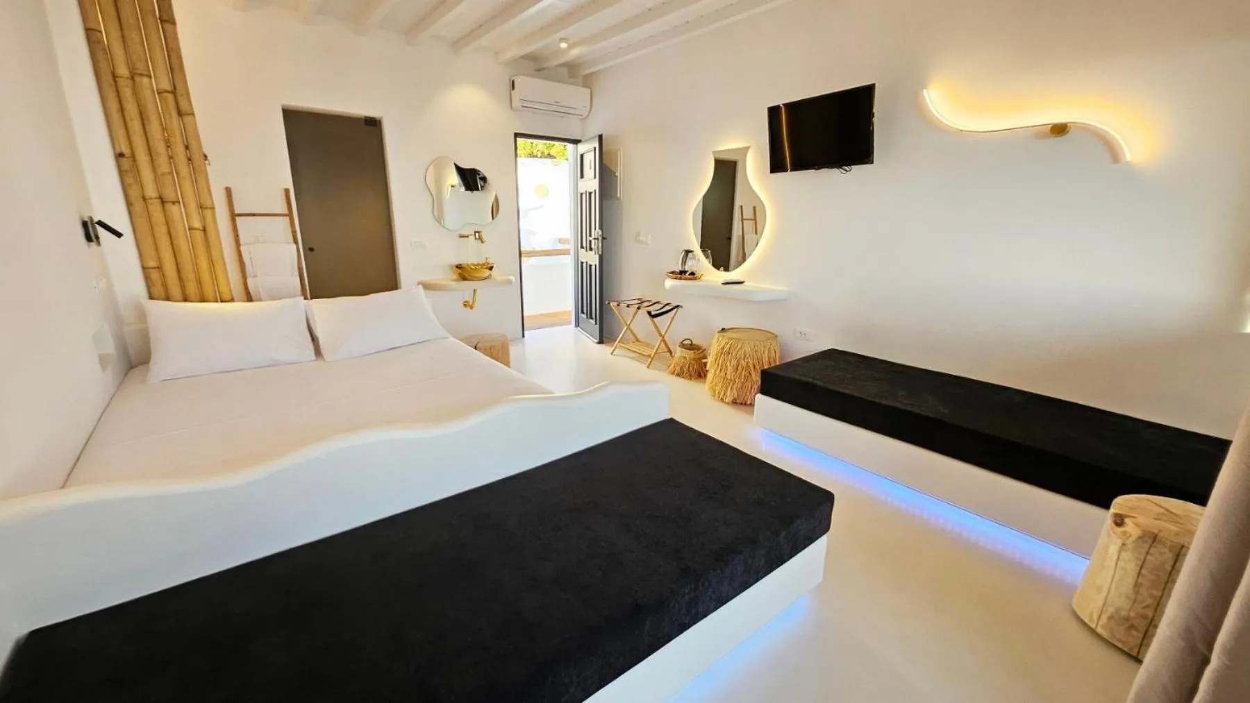 Photo of the whole room, Bed in ELLI TROPiCAL LUXURY SUITES SUNSET-INFINITY POOL- SEA SIDE-NEAR CENTER PARKING