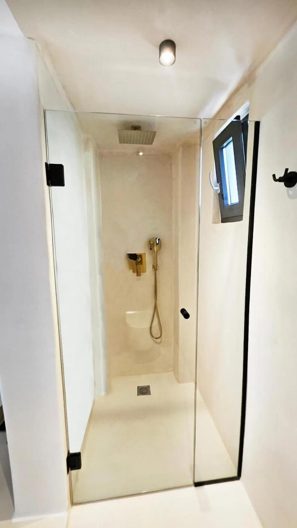 Shower in ELLI TROPiCAL LUXURY SUITES SUNSET-INFINITY POOL- SEA SIDE-NEAR CENTER PARKING