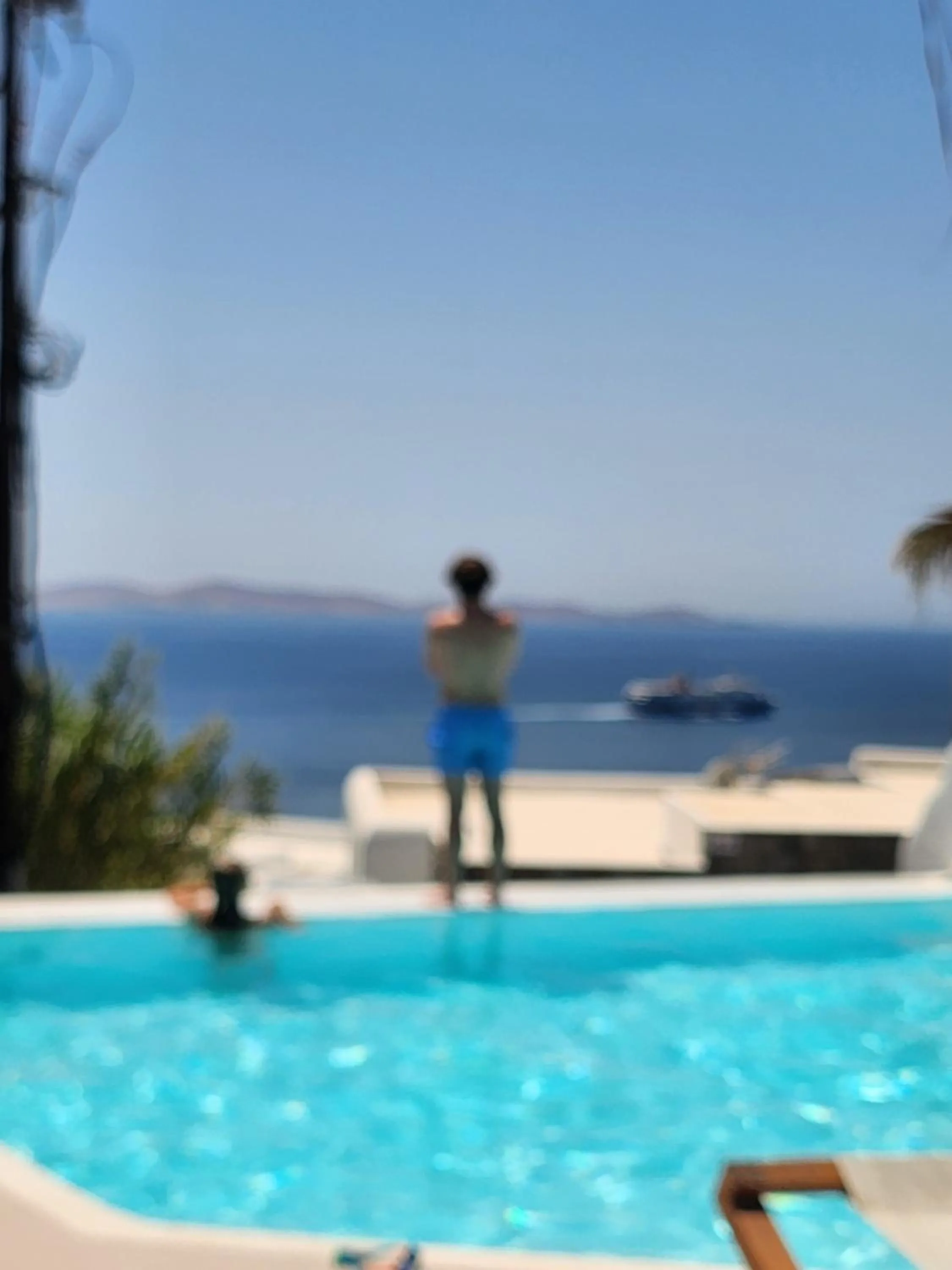 Swimming pool in ELLI TROPiCAL LUXURY SUITES SUNSET-INFINITY POOL- SEA SIDE-NEAR CENTER PARKING