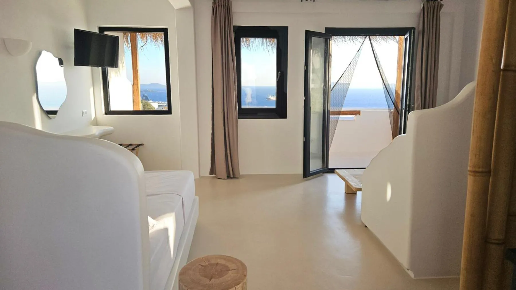 Photo of the whole room, Bed in ELLI TROPiCAL LUXURY SUITES SUNSET-INFINITY POOL- SEA SIDE-NEAR CENTER PARKING